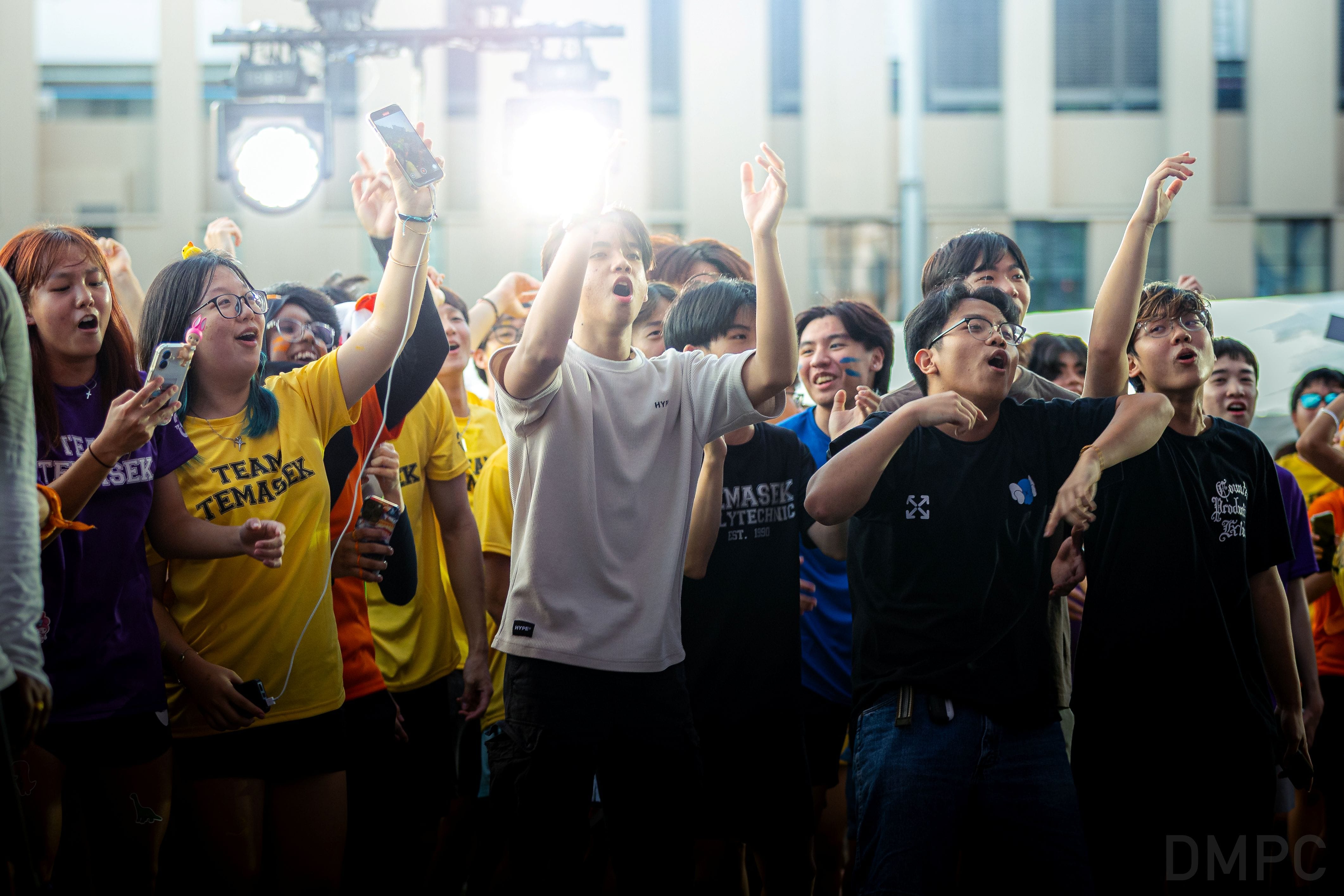 Image of students grooving and cheering along at the SpecTACular concert