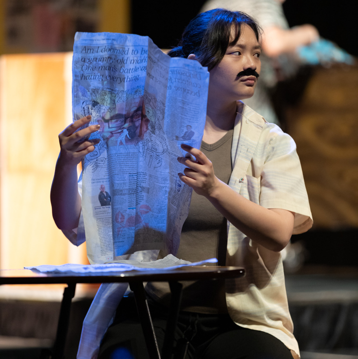 Image of a Teatro member performing at an event