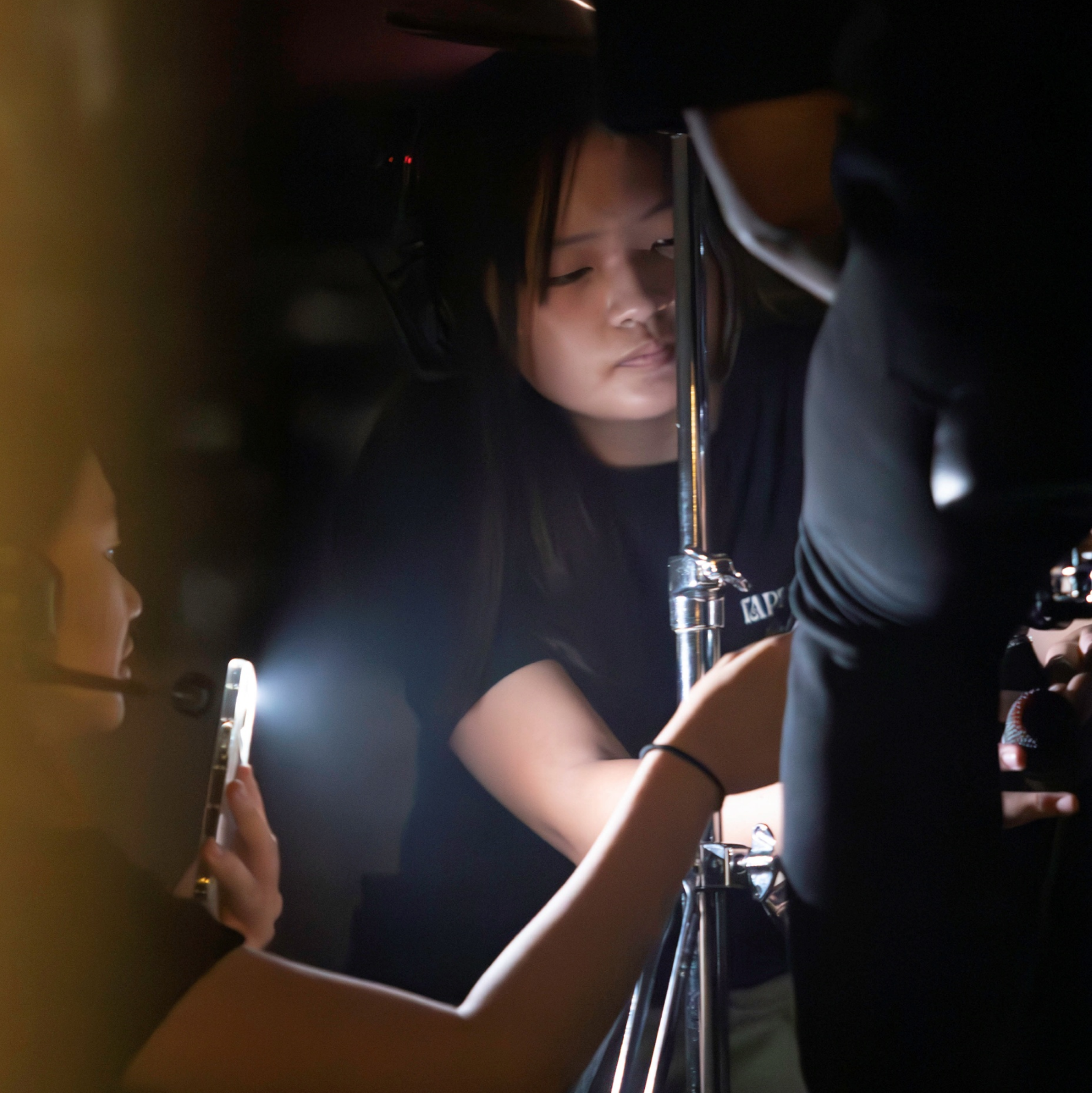 Image of a DMPC member working behind-the-scenes at an event 3