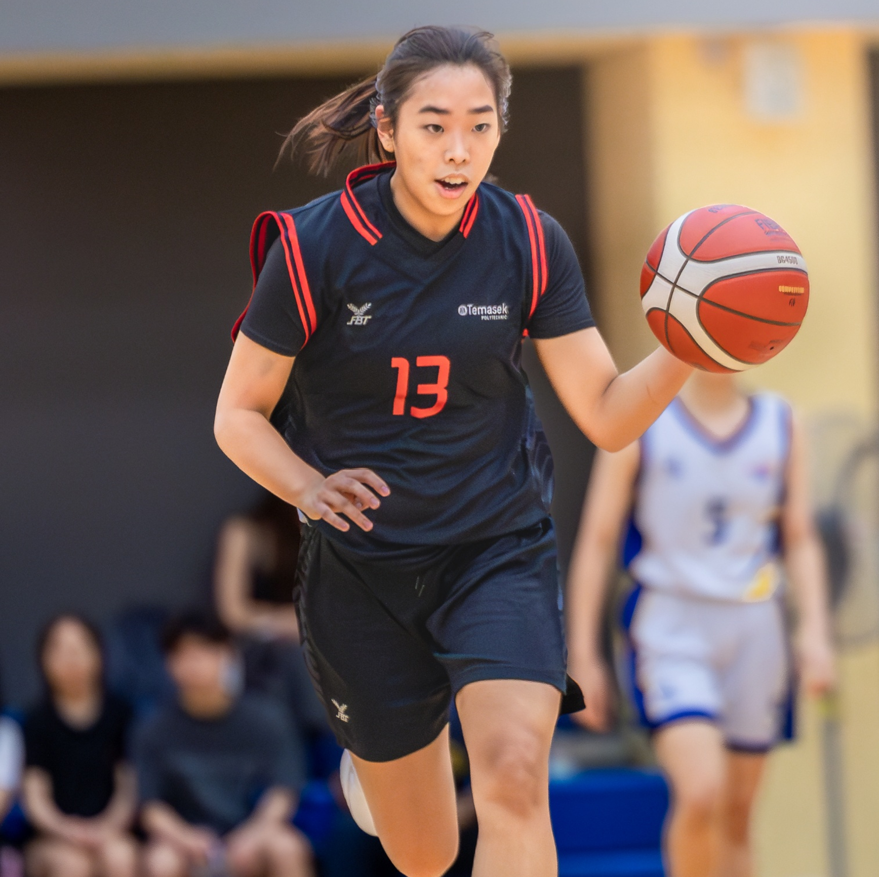 Image of a Basketball player engaging in the sport