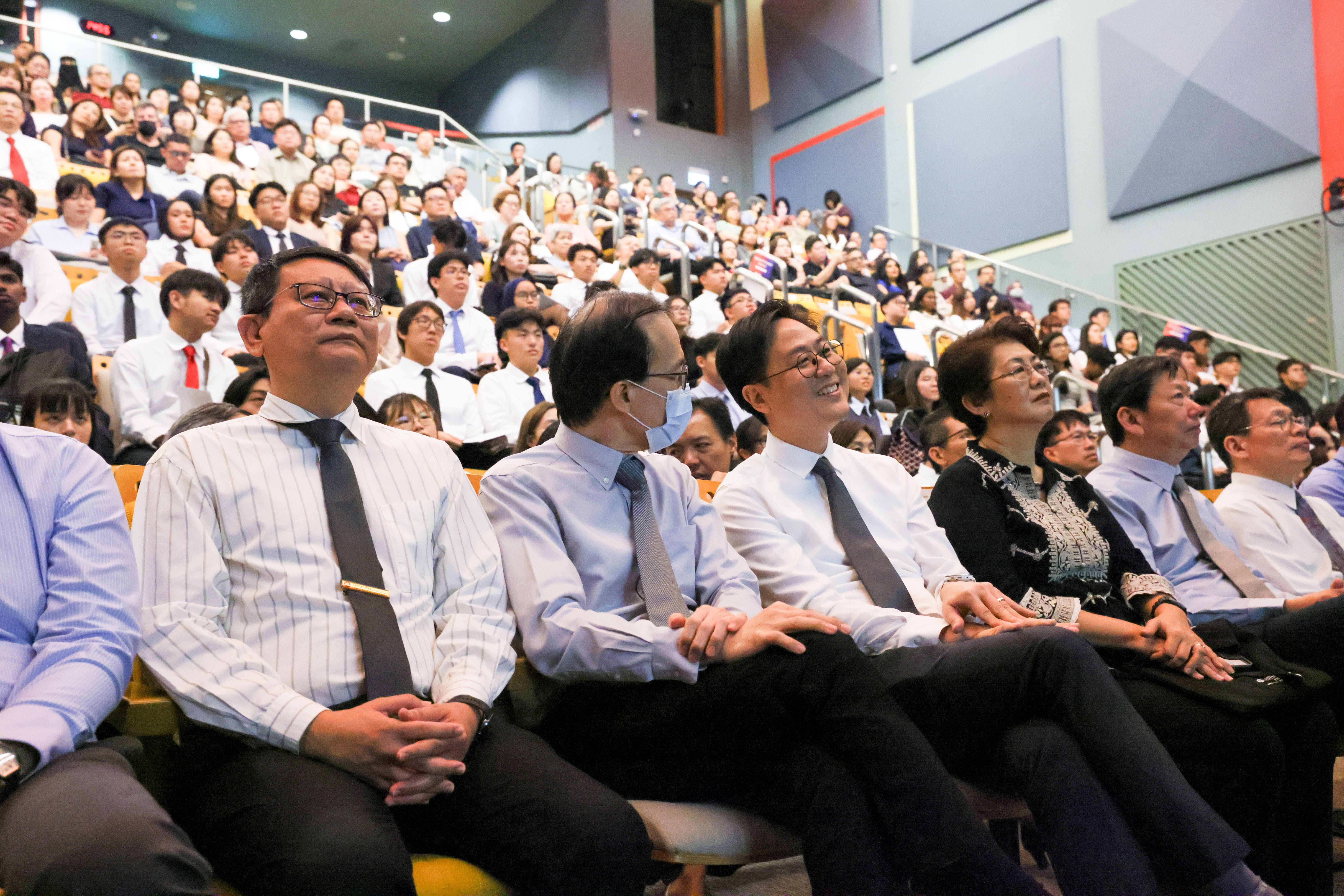 Image of Temasek Polytechnic's senior management viewing the TP Scholarships Presentation proceedings in the auditorium