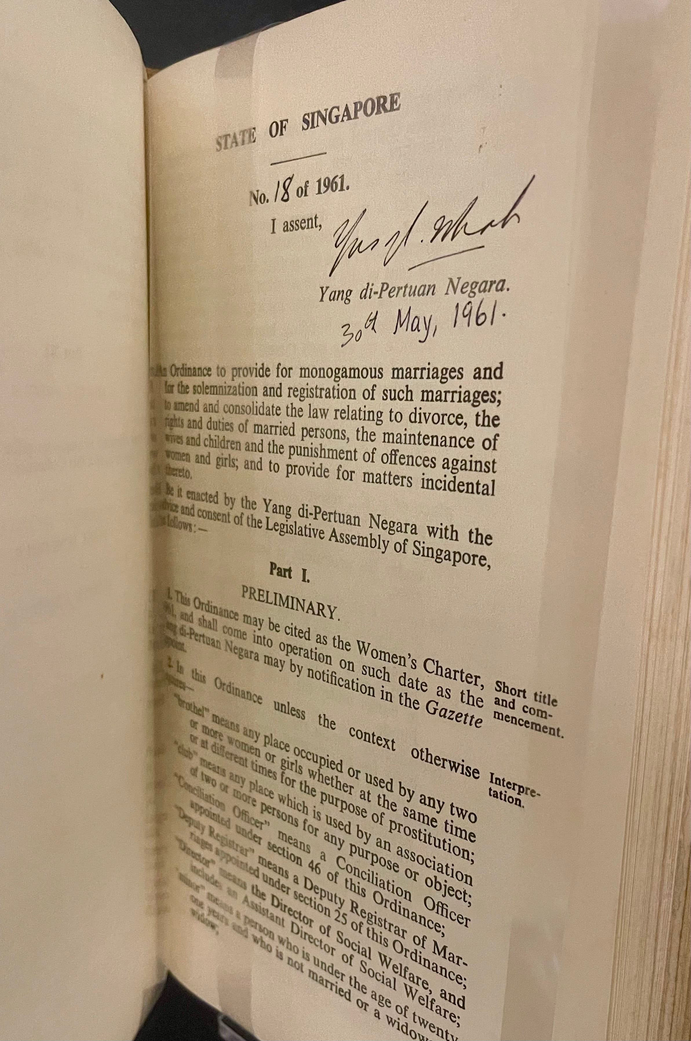 An open aged document titled State of Singapore, No. 18 of 1961, signed by Yang di-Pertuan Negara on 30th May 1961.
