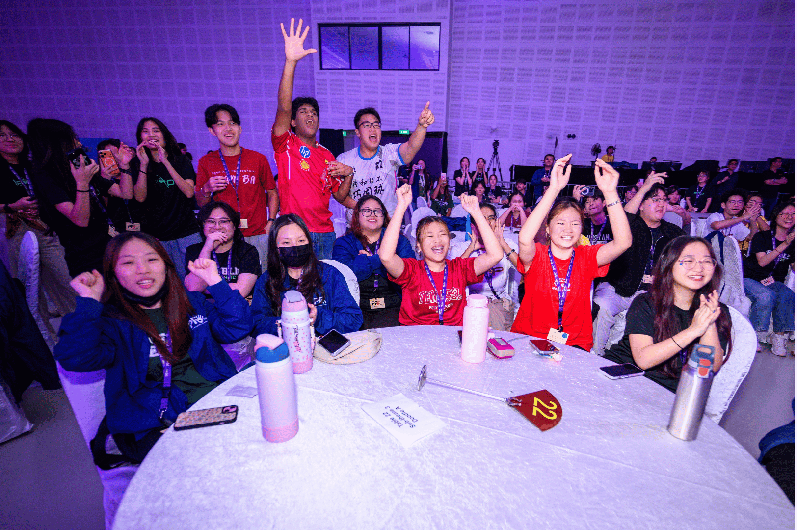 students cheering for their friends at social night 