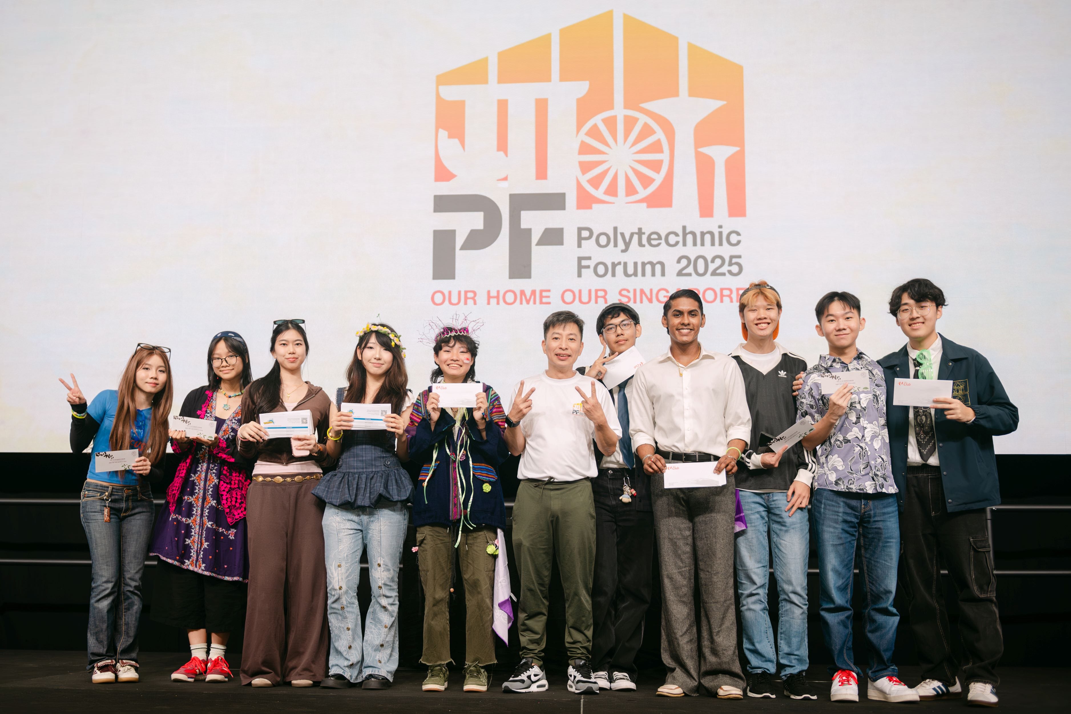 Group of young people holding certificates on stage in front of a Polytechnic Forum 2025 banner.