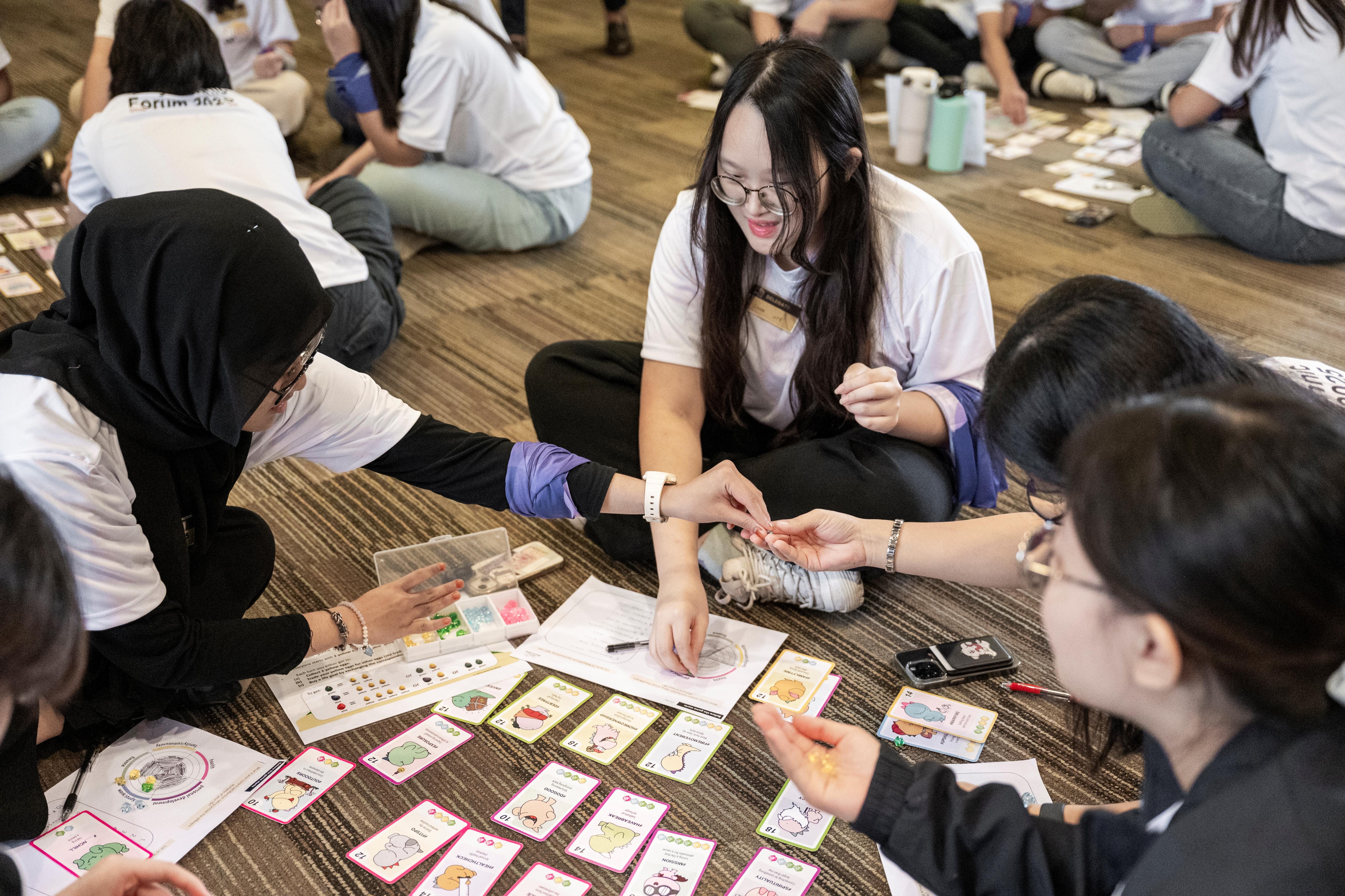 Student doing mission with group members