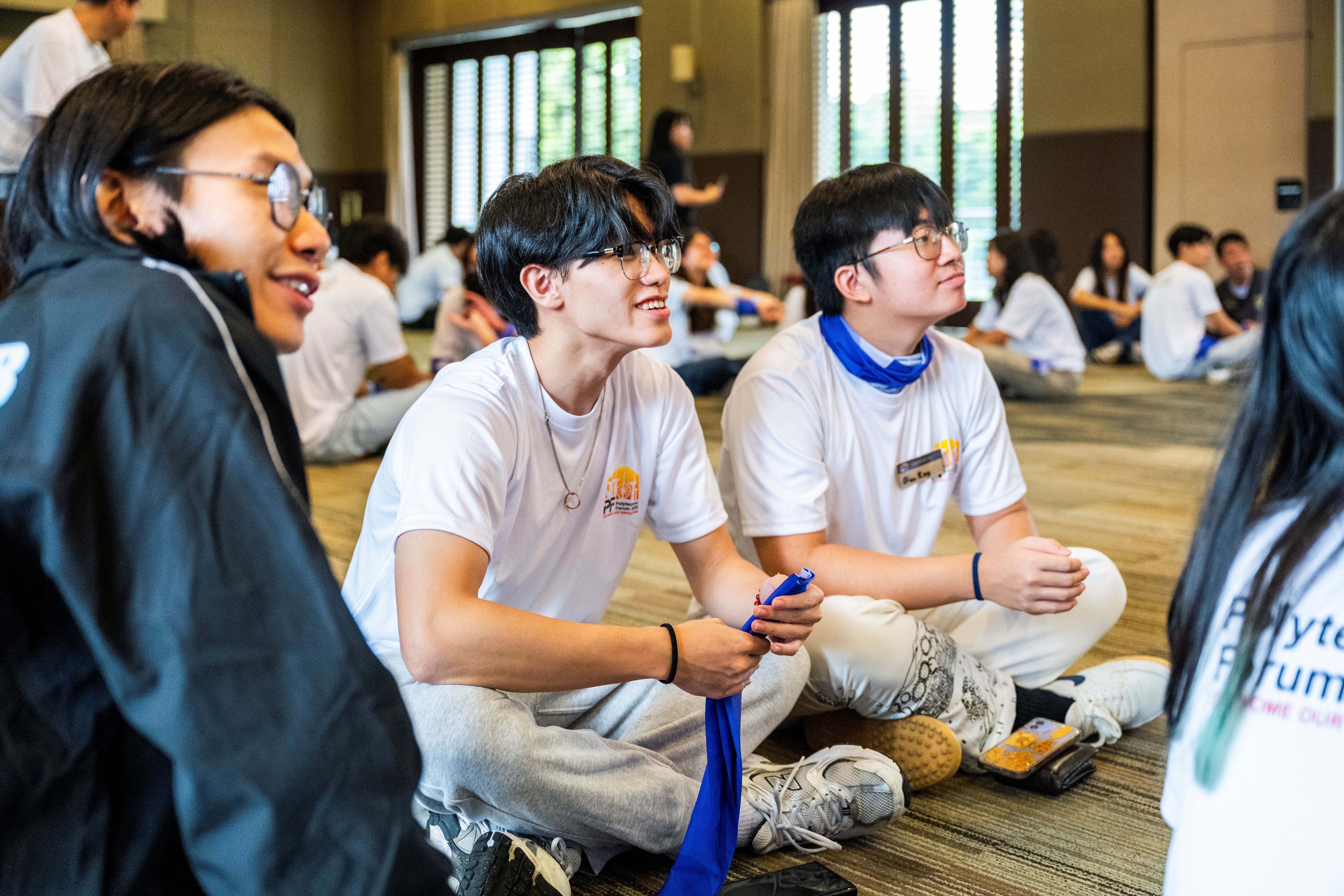 Students looking forward and smiling