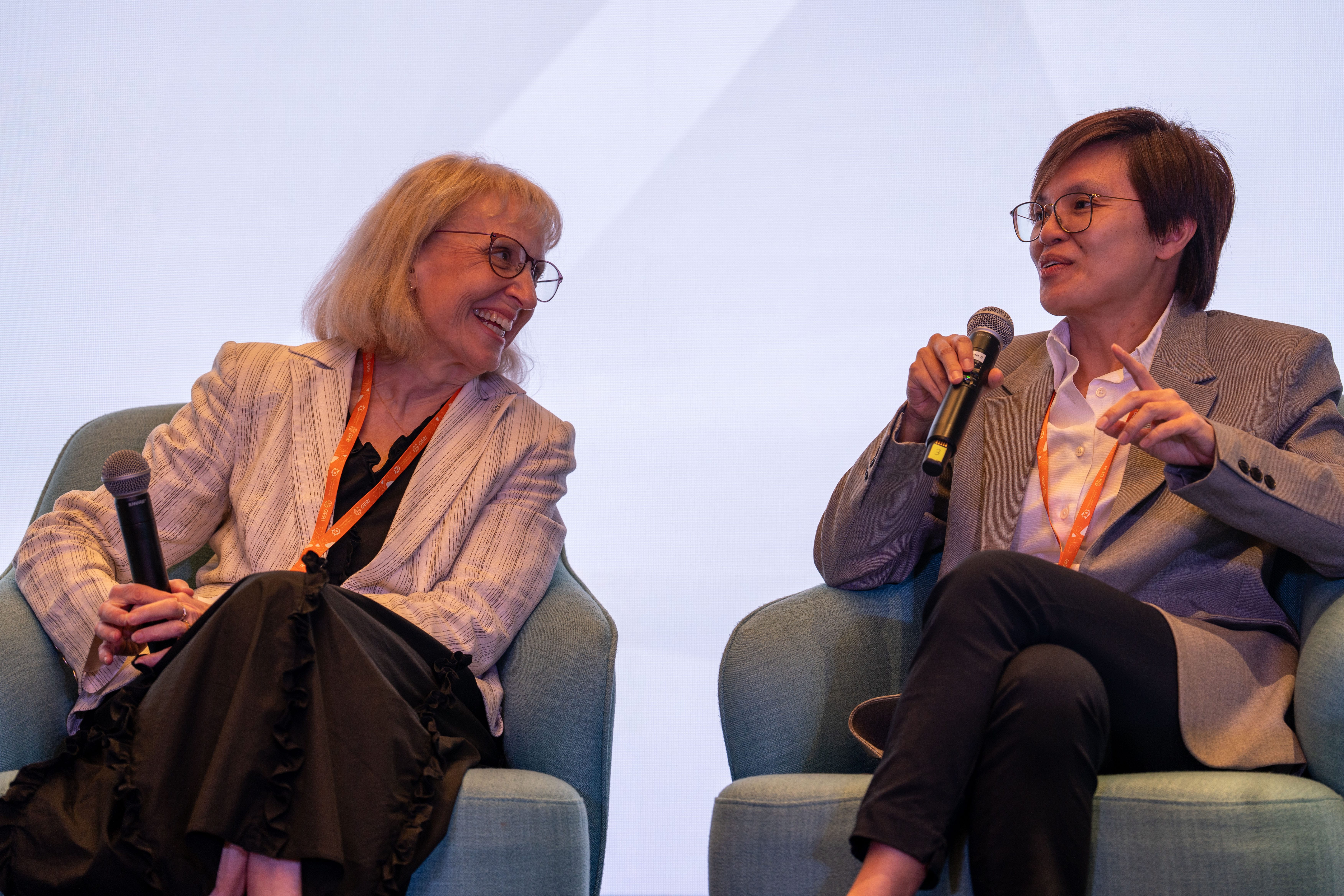 Speakers answering a question on stage