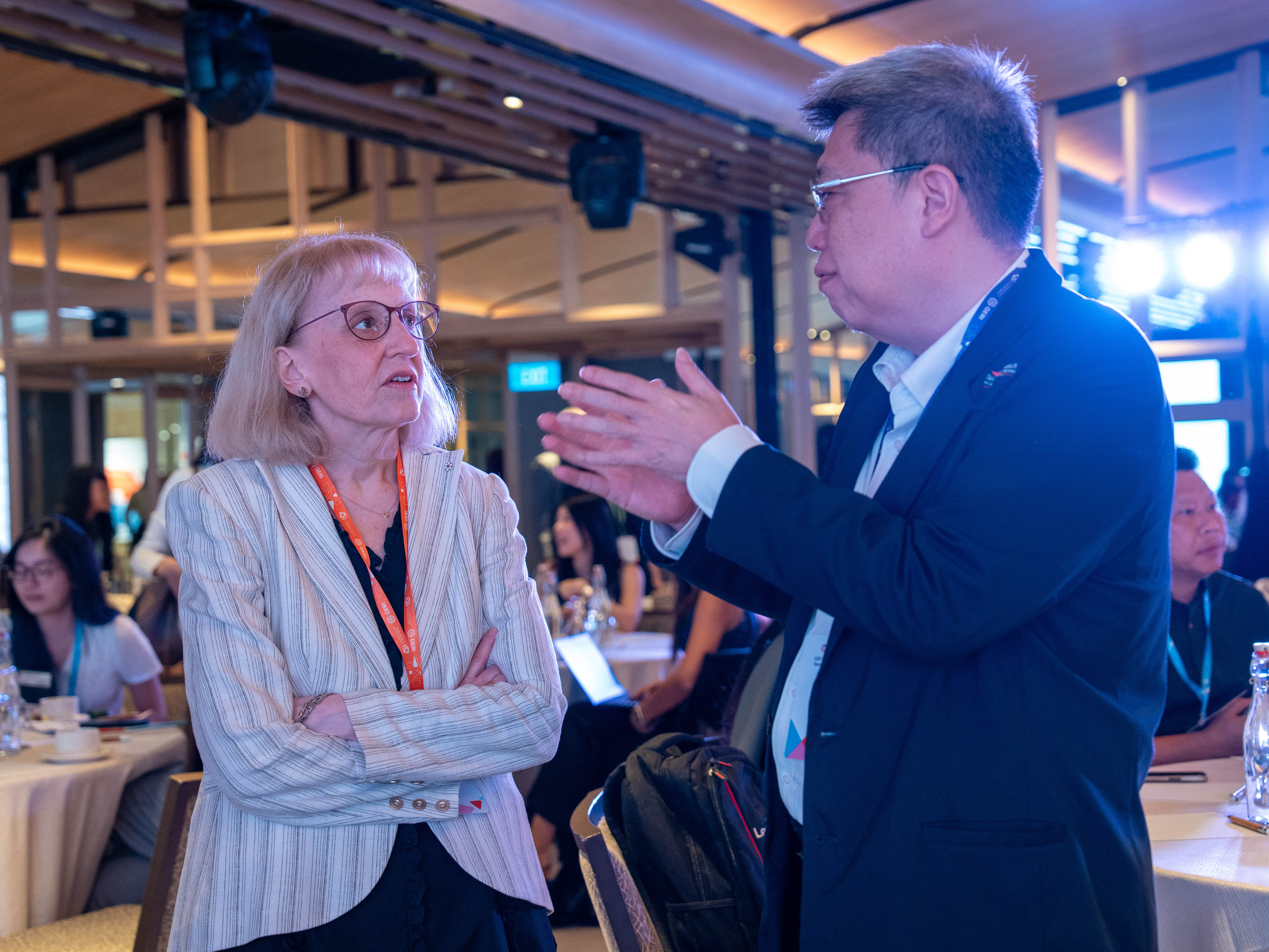 Guests interacting inside the ballroom