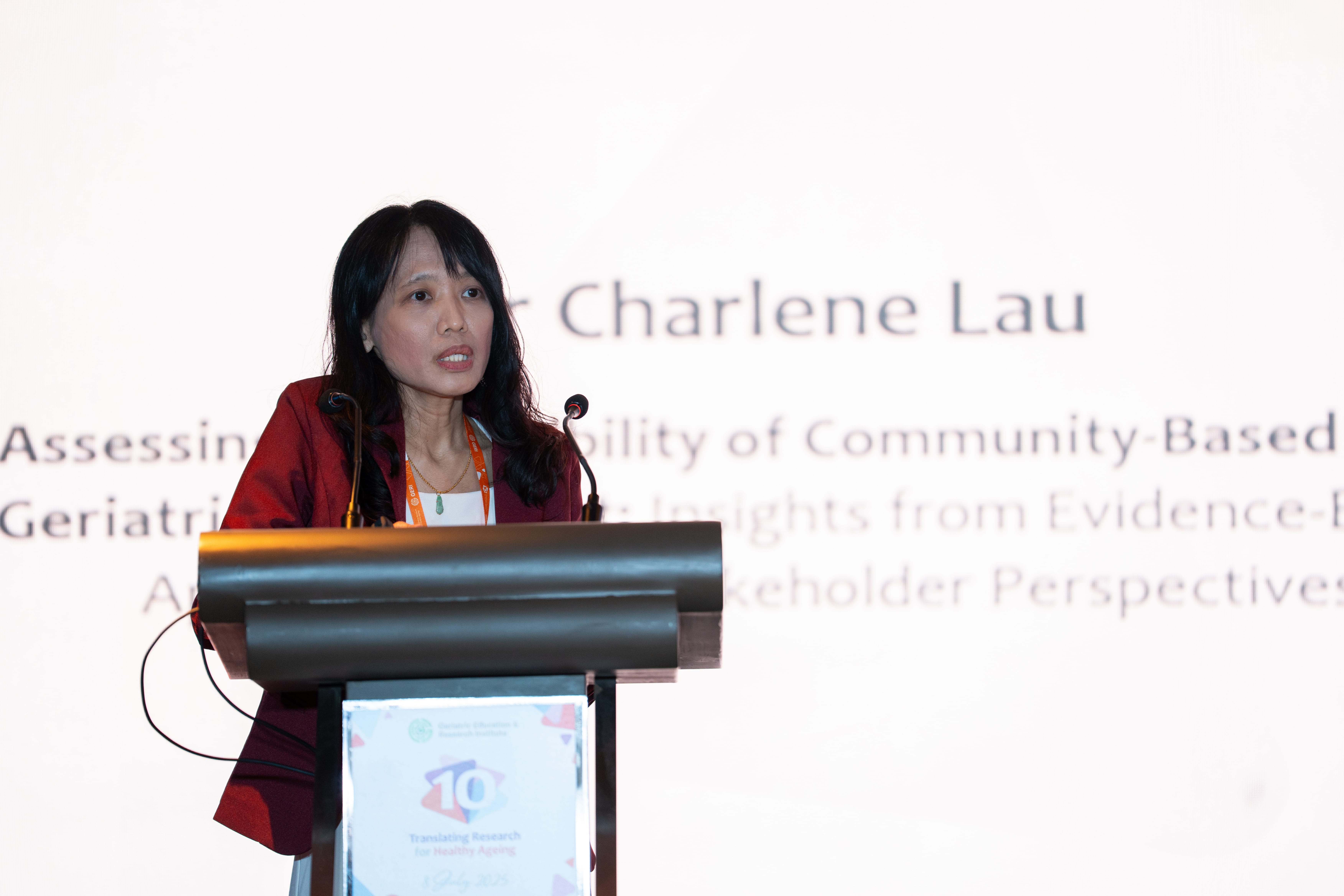 Woman giving a presentation on stage