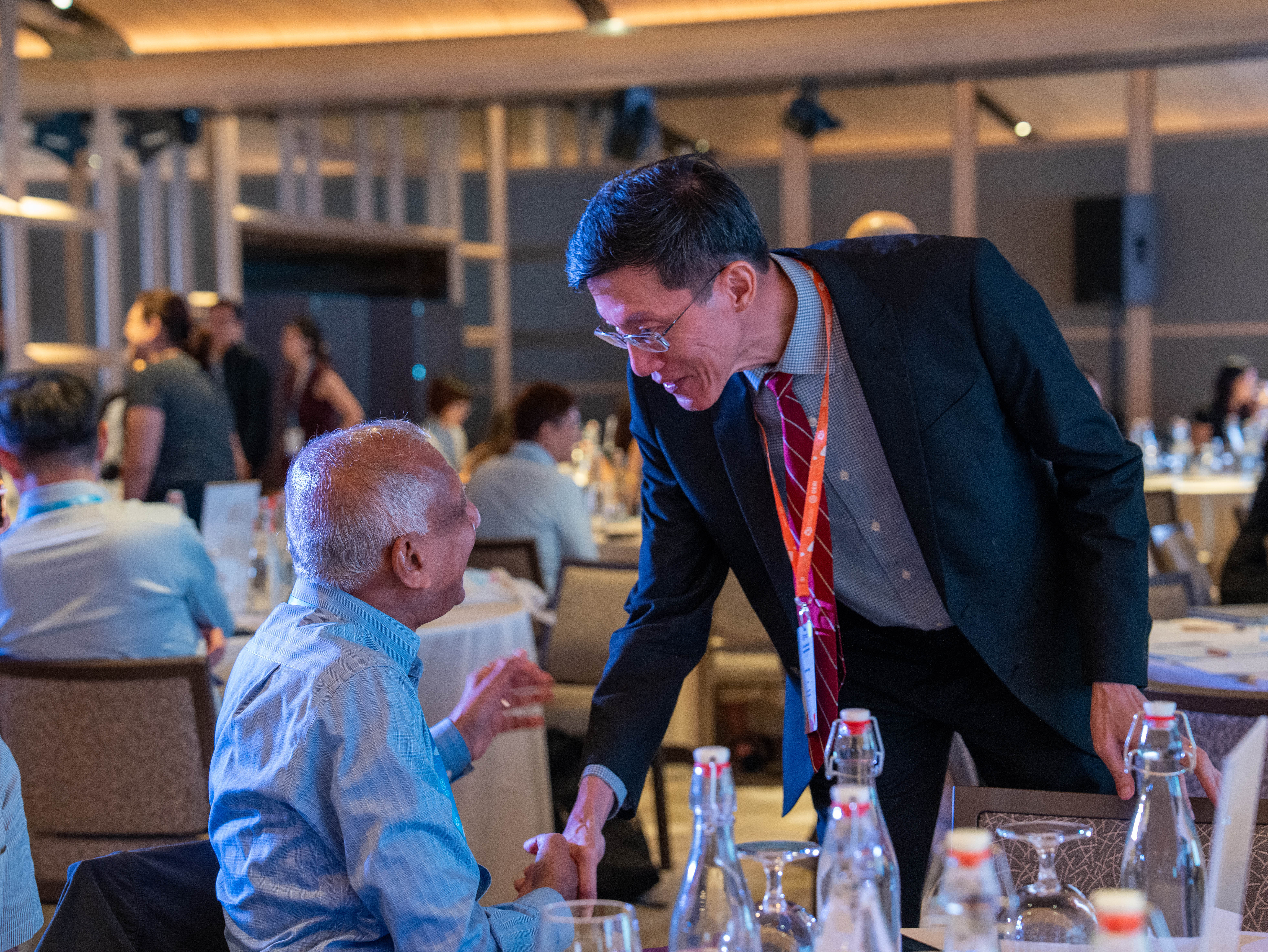 Participants interacting in the ballroom