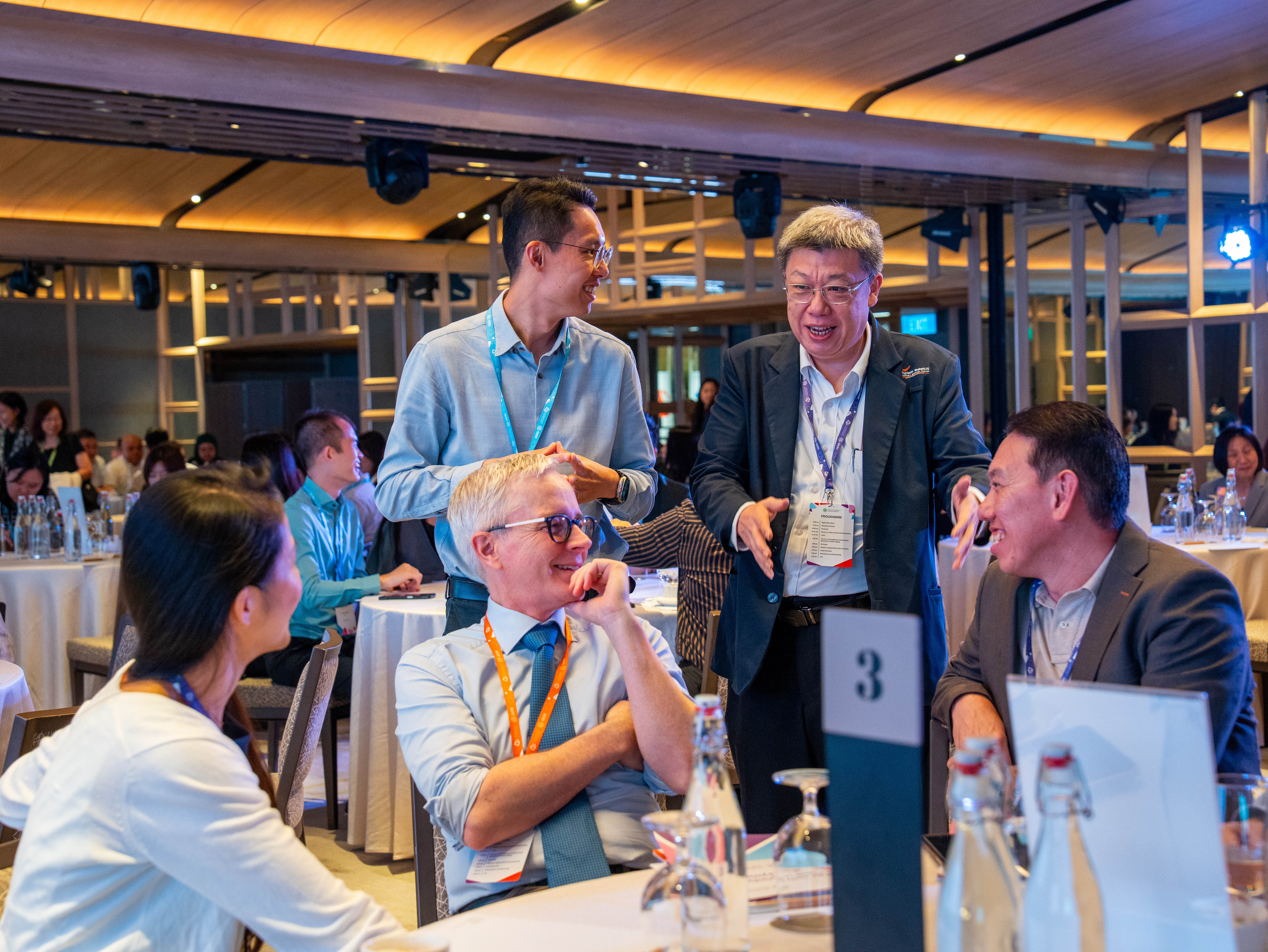 Guests interacting in the ballroom