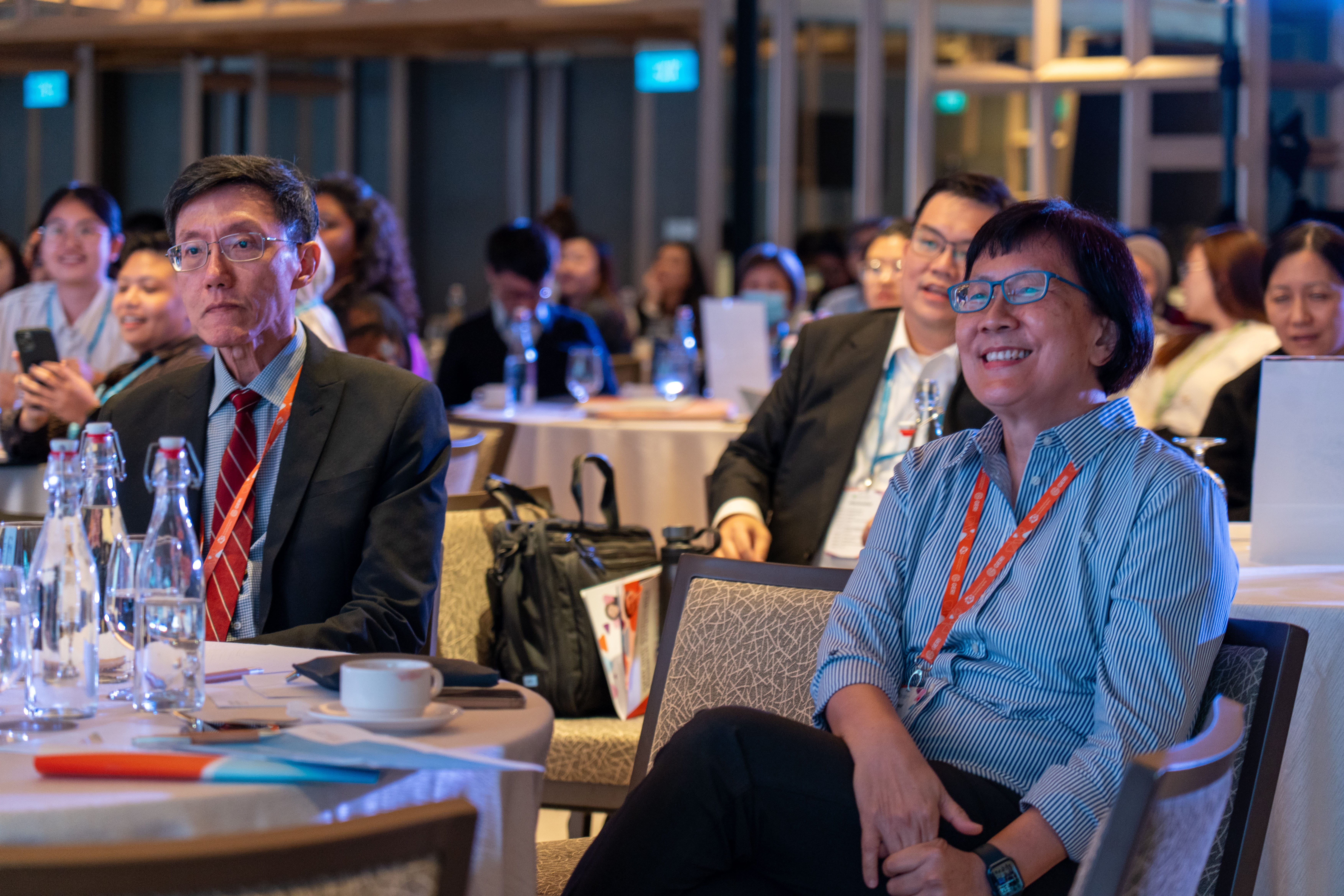 Participants enjoying a presentation