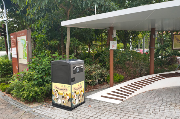 Solar-powered talking rubbish bin near shelter at Jurong Lake Gardens.