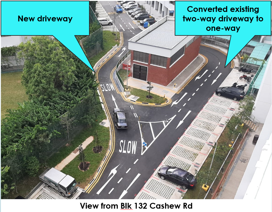 Overhead view of a reconfigured driveway with new and one-way sections. Cars are present. Text annotations.