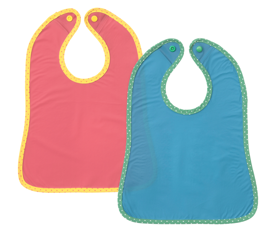 Two baby bibs, one pink with yellow dotted trim and one blue with green dotted trim, each with snap closures.