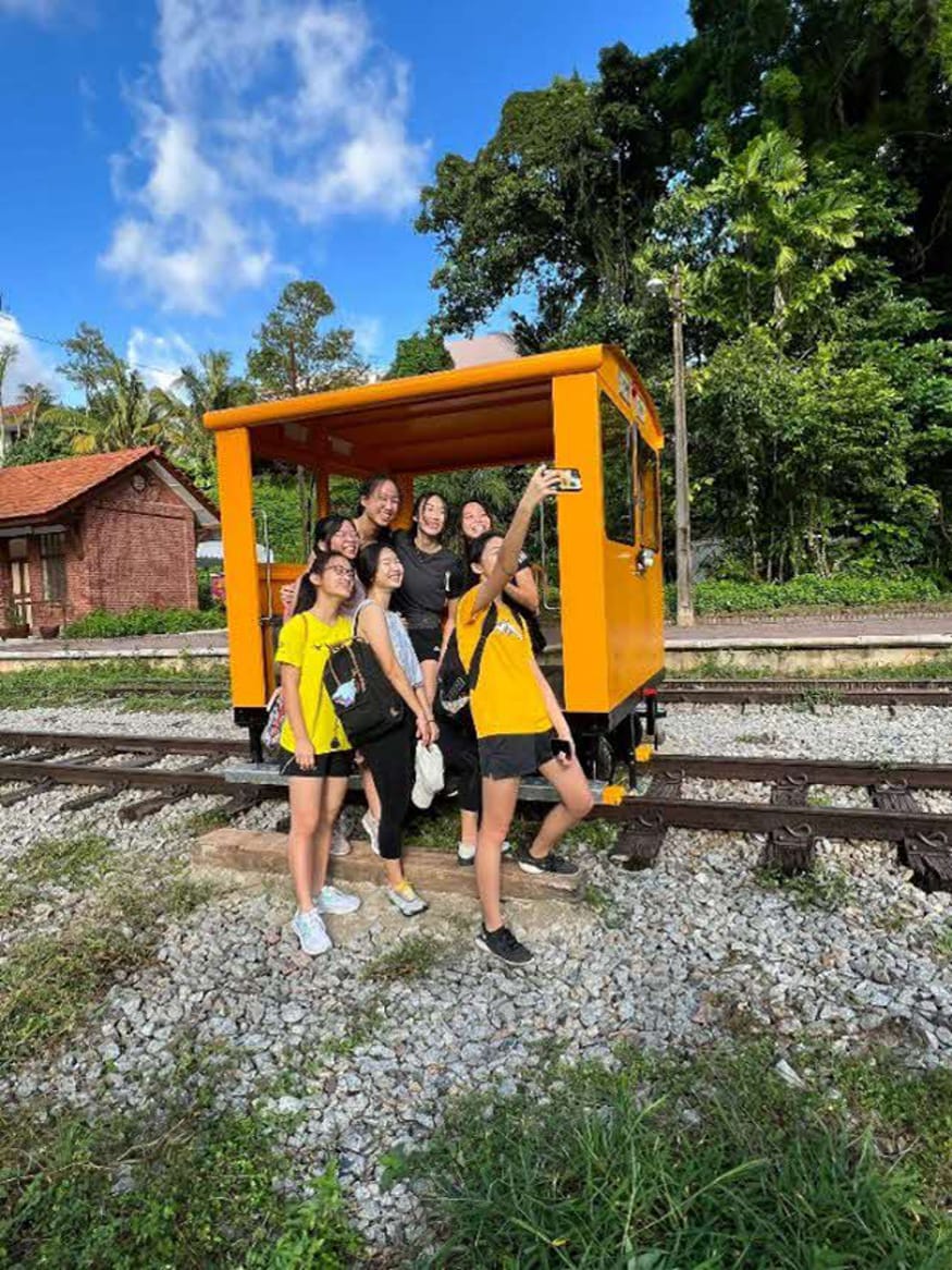 Photo of students taking a selfie at the Rail Corridor