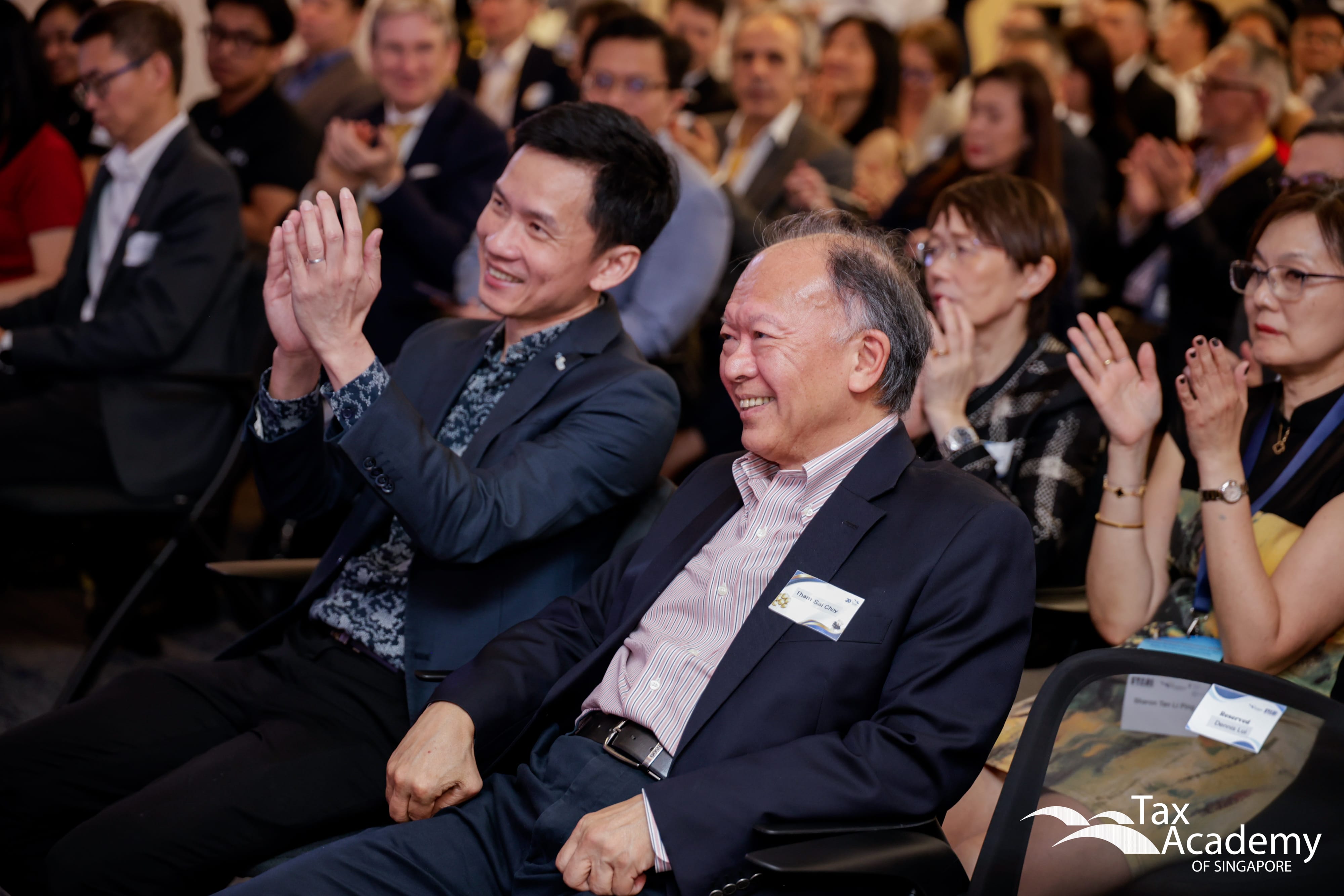 Commissioner of Inland Revenue, Mr Ow Fook Chuen, and Chairman of Tax Academy Board, Mr Tham Sai Choy, having a good time at the Opening of Tax Academy of Singapore Hub