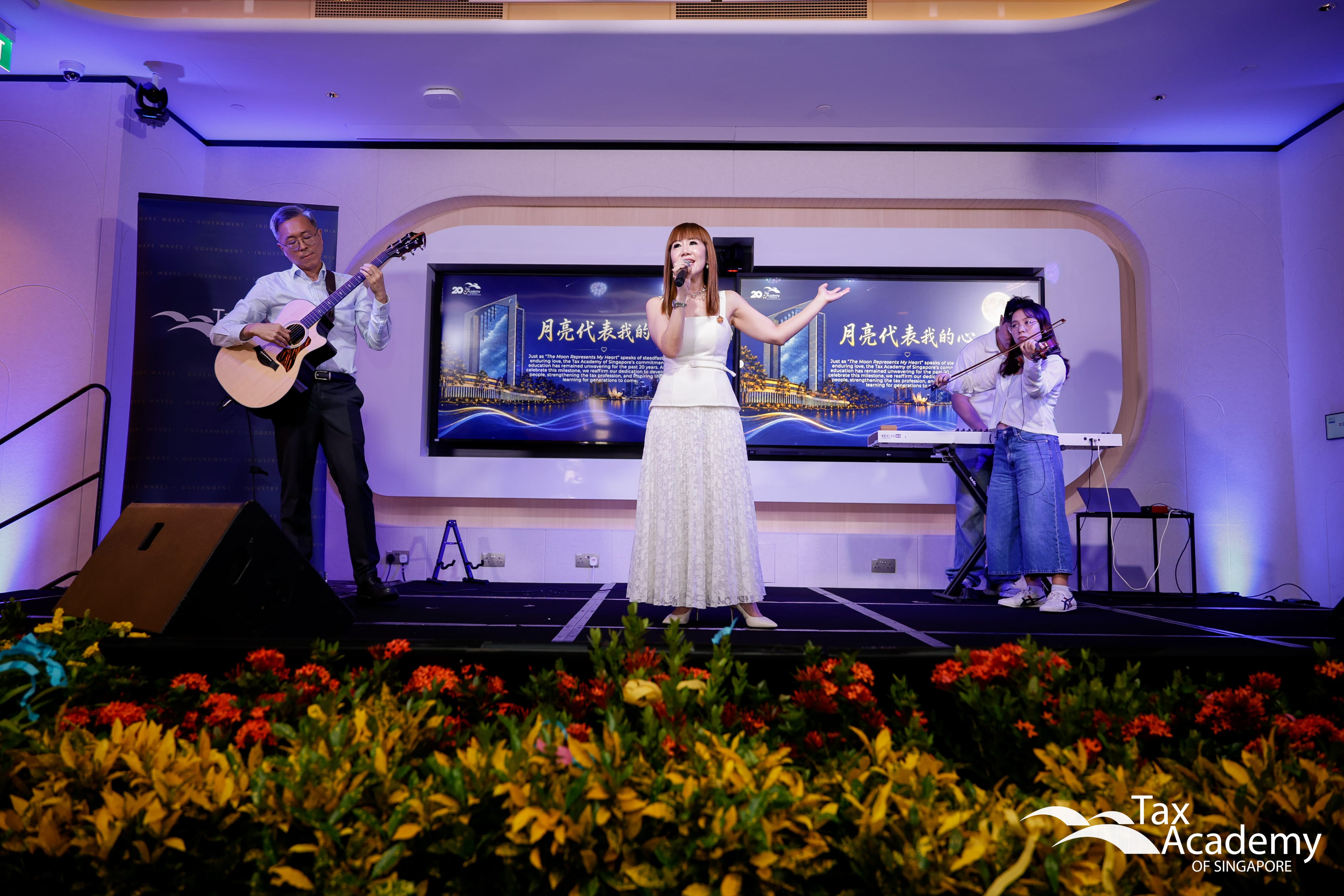 Ms Eunice Toh, Associate Director of Tax Academy of Singapore, singing at the Opening of Tax Academy of Singapore Hub