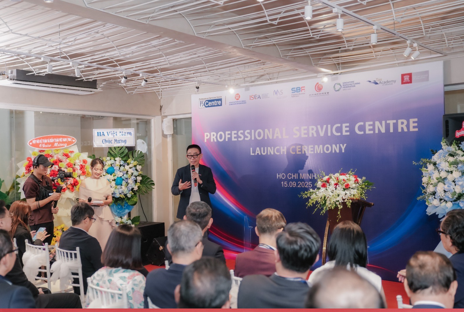 A man speaks at a Professional Service Centre Launch Ceremony in Ho Chi Minh City on 15.09.2025.