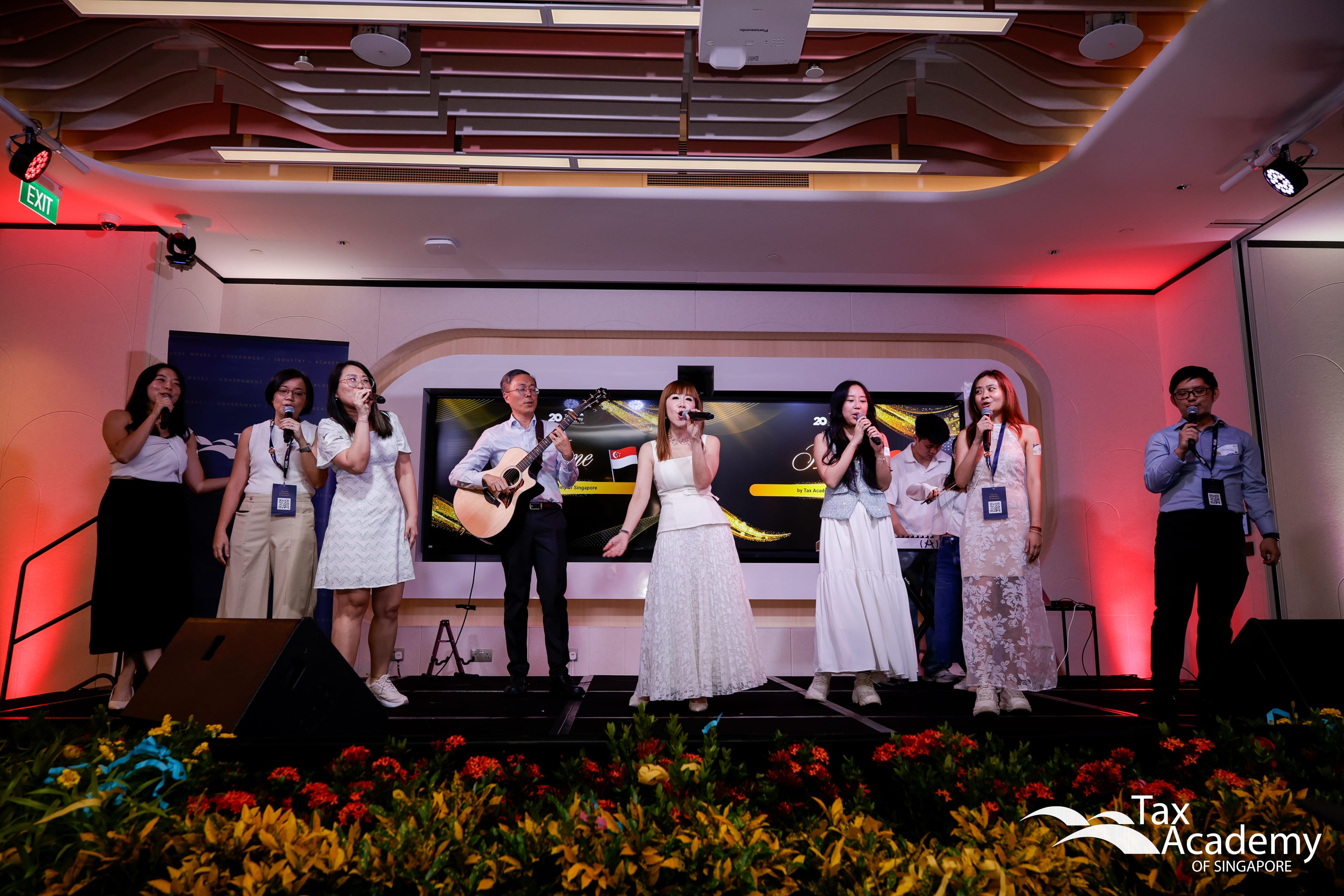 The Programme Managers of Tax Academy of Singapore, singing in Unison at the Opening of Tax Academy of Singapore Hub