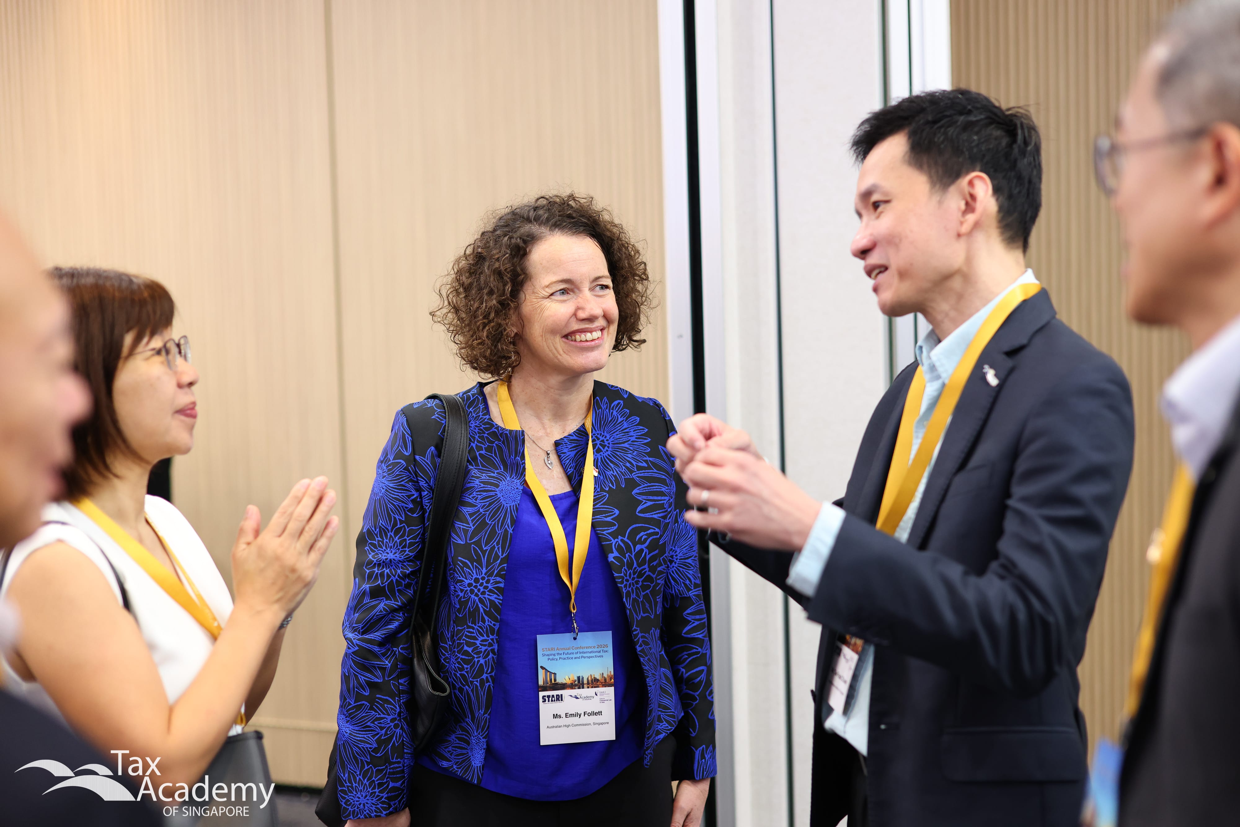 Commissioner of IRAS, Mr Ow Fook Chuen, speaking to Australian Deputy High Commissioner to Singapore, Ms Emily Follett