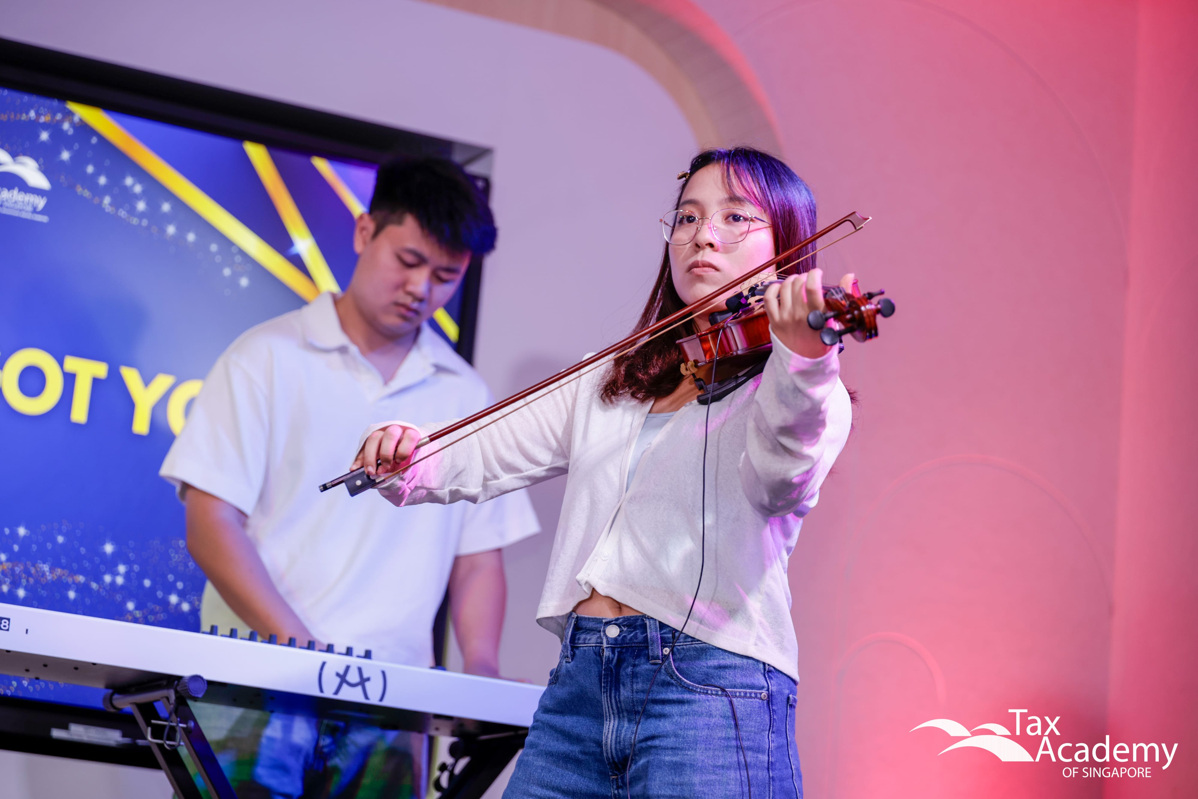 Ms Shaine Goh as the Violinist for the Special Performance at the Opening of Tax Academy of Singapore Hub