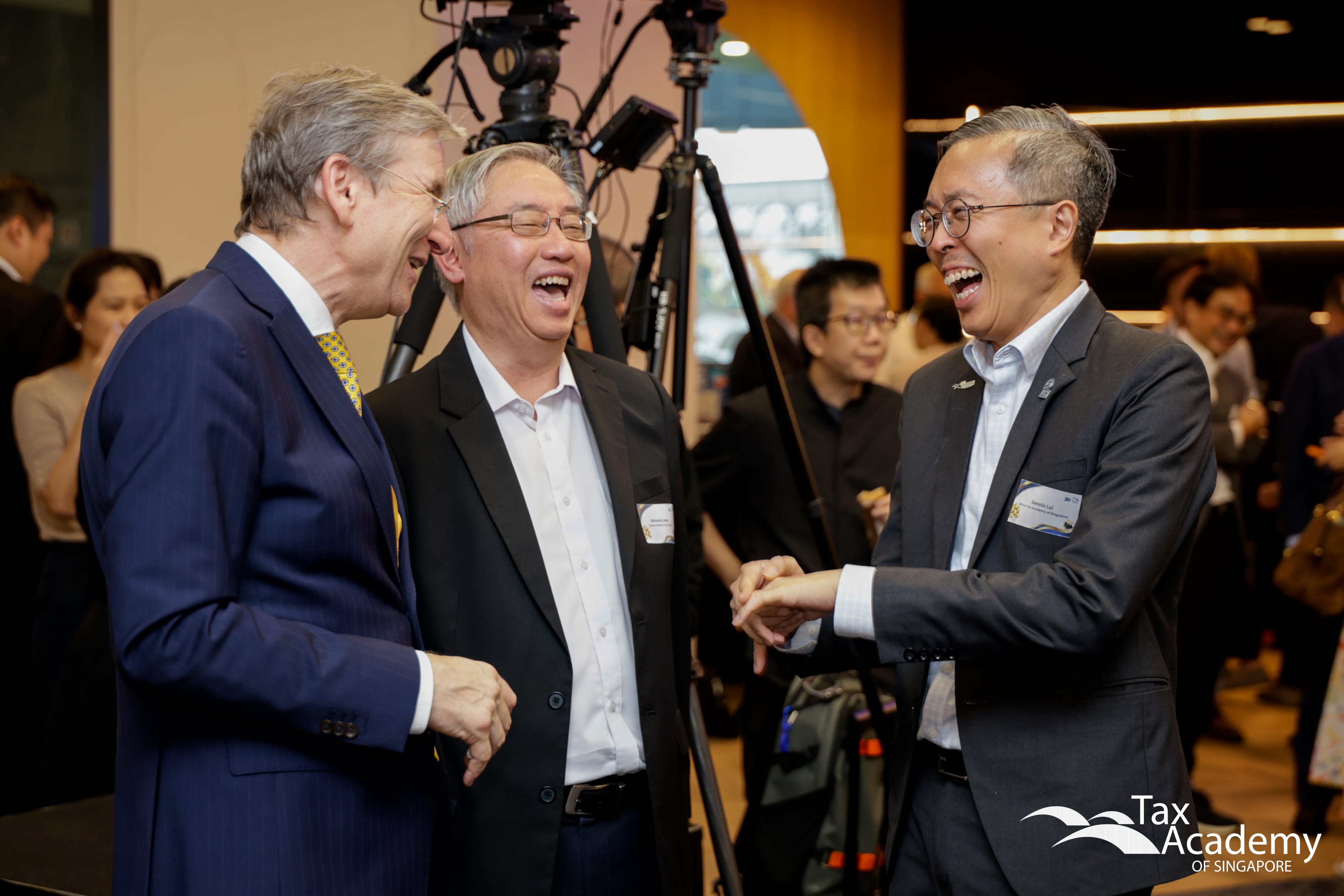 Mr Dennis Lui, Professor Martin Wenz, and a VIP, having a good time