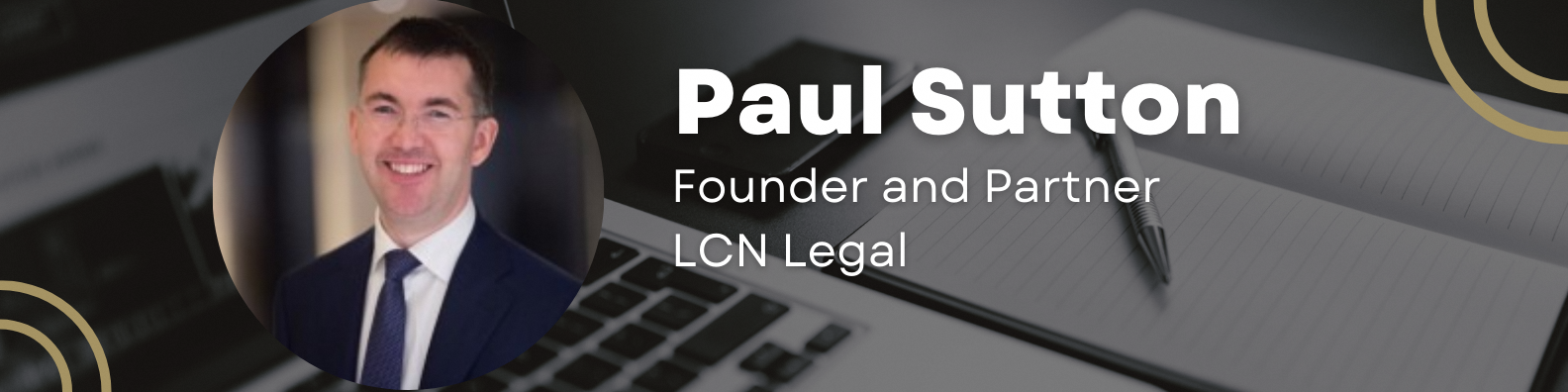 Paul Sutton, Founder and Partner at LCN Legal, smiling man in a suit beside a laptop background.