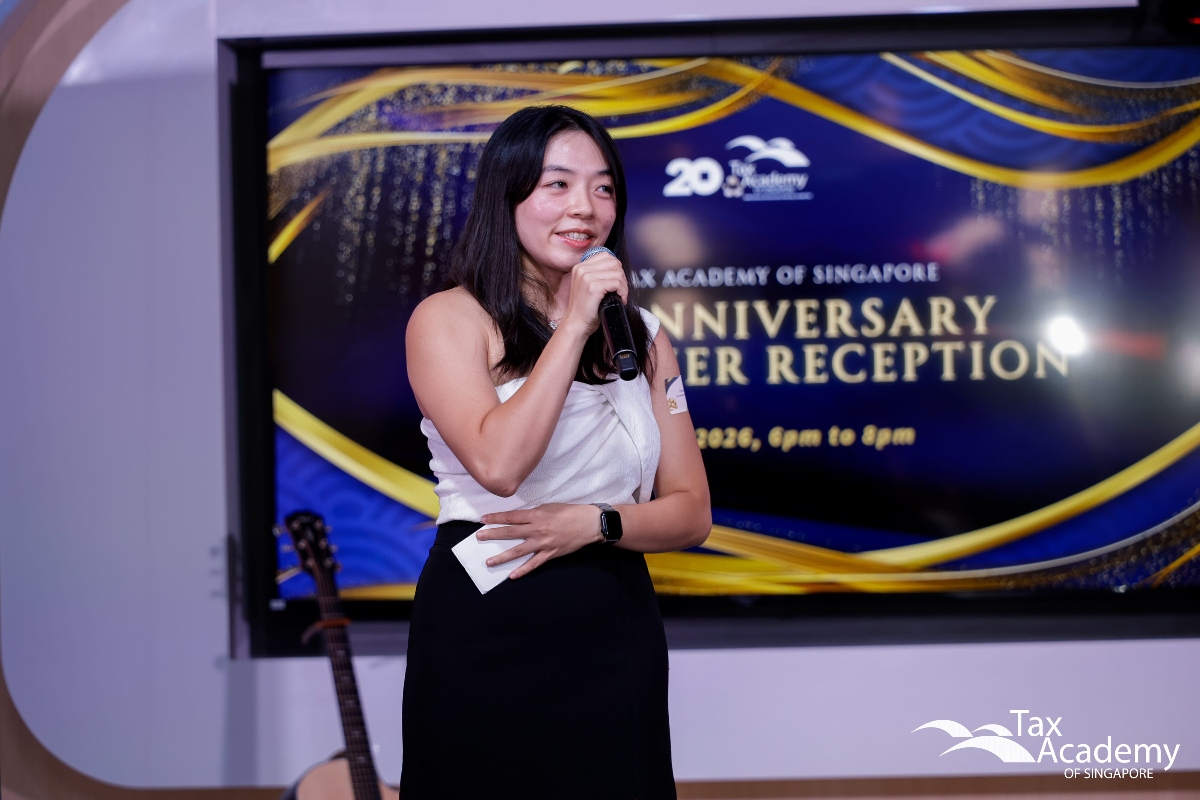 Ms Yvonne Loh, emceeing at the Opening of Tax Academy of Singapore Hub