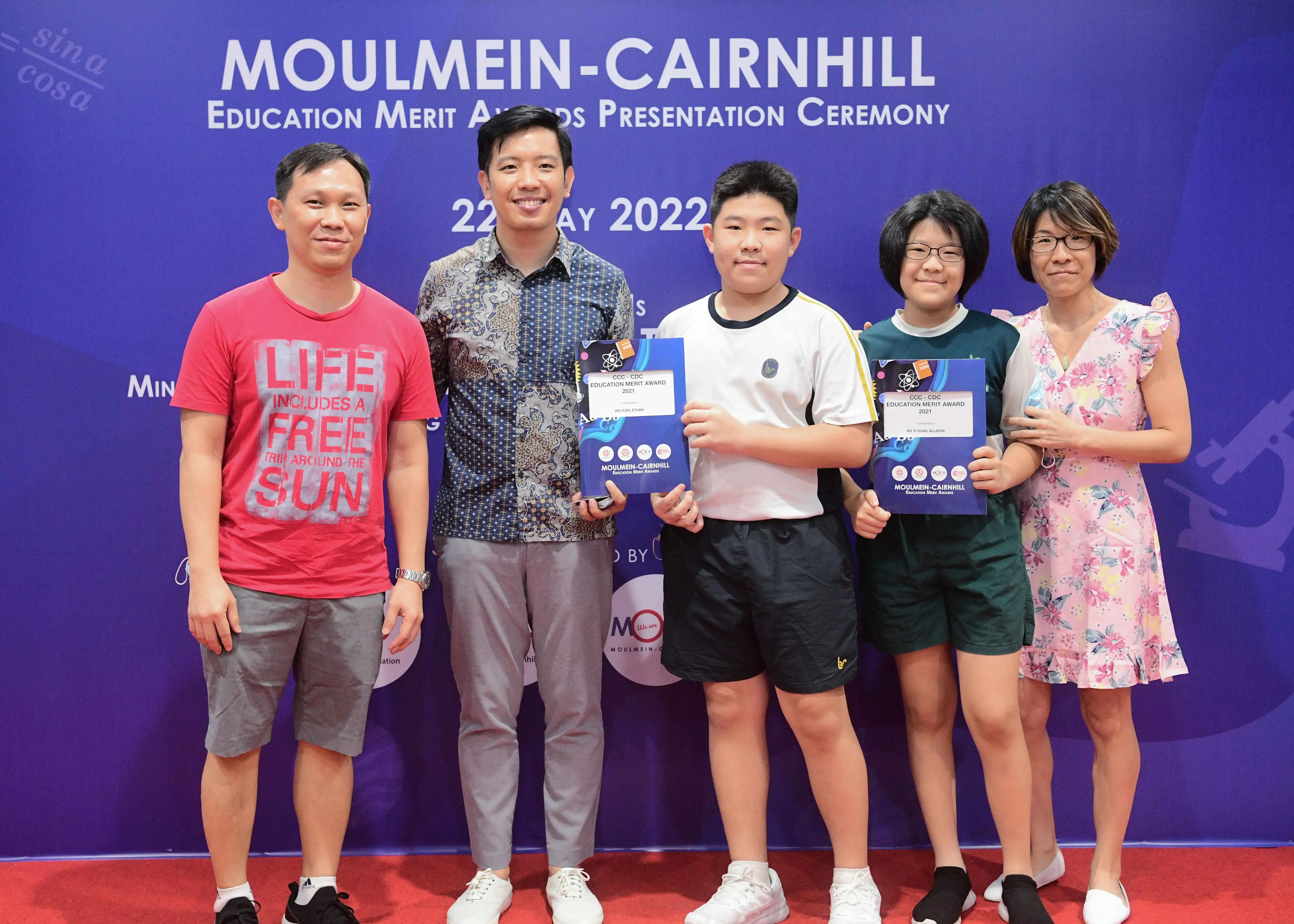 Five people pose at the Moulmein-Cairnhill Education Merit Awards Presentation Ceremony on 22 May 2022.