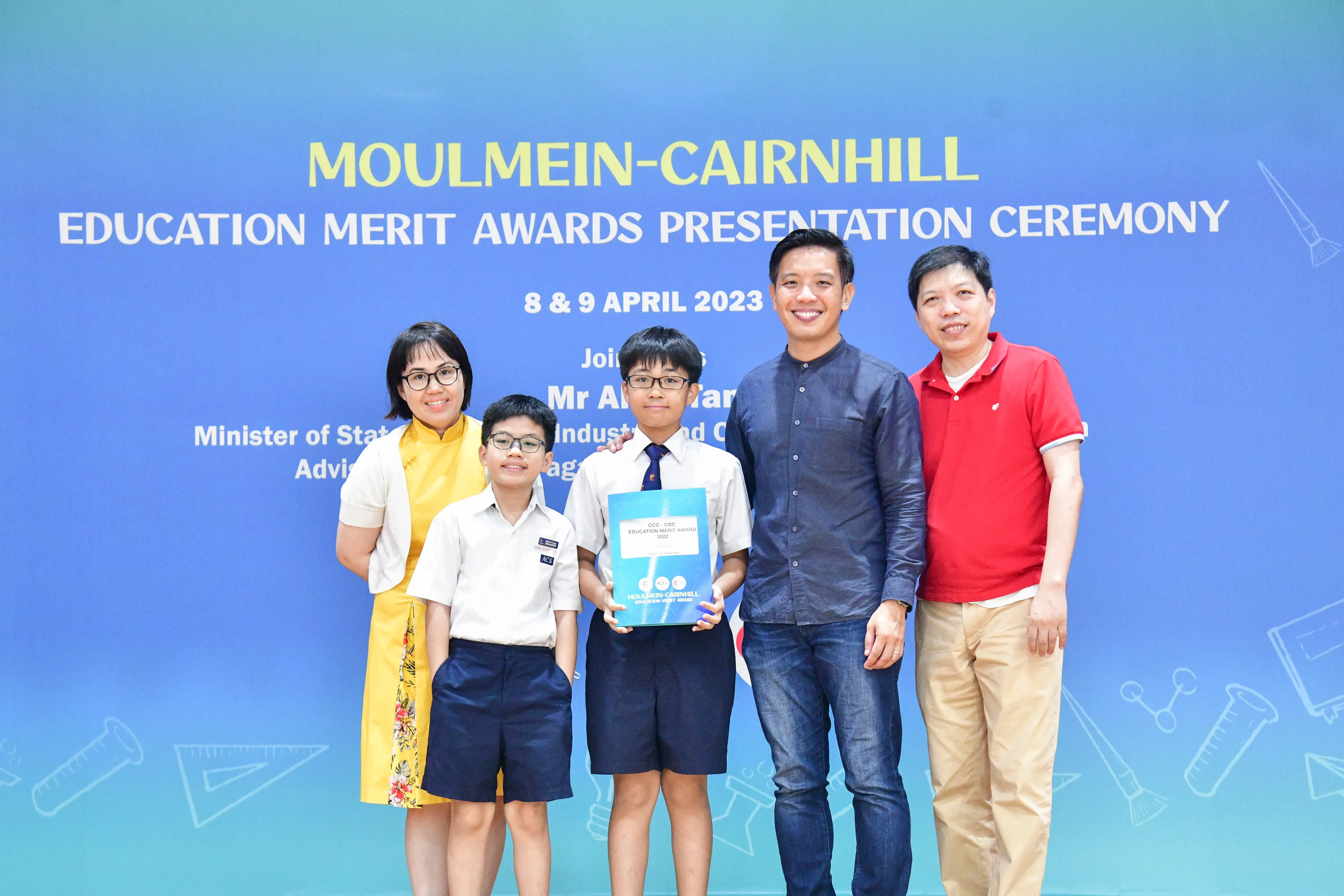 Five people pose at the Moulmein-Cairnhill Education Merit Awards Presentation Ceremony on 8 & 9 April 2023.