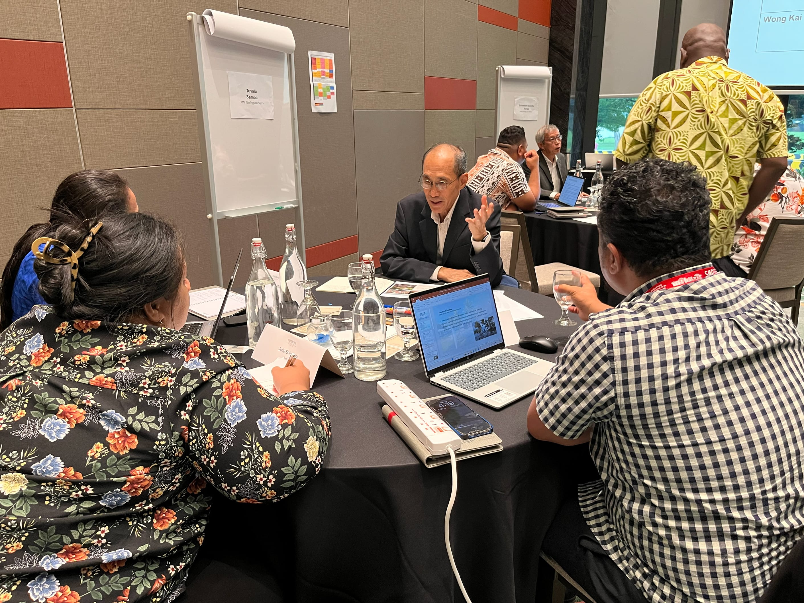 Participants discussing urban resilience solutions with Singapore resource persons during Action Planning component.