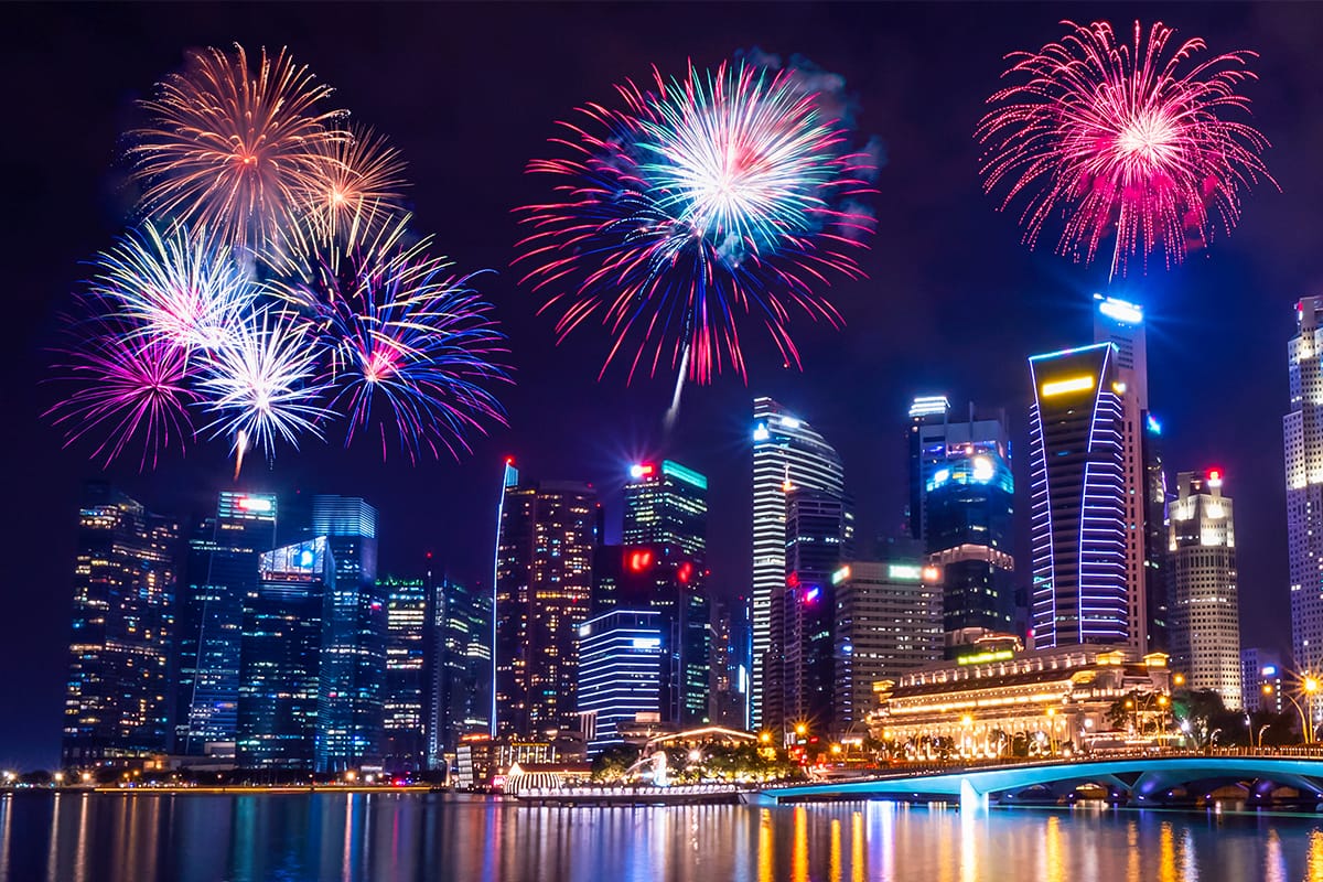 Night view of Singapore CBD with fireworks