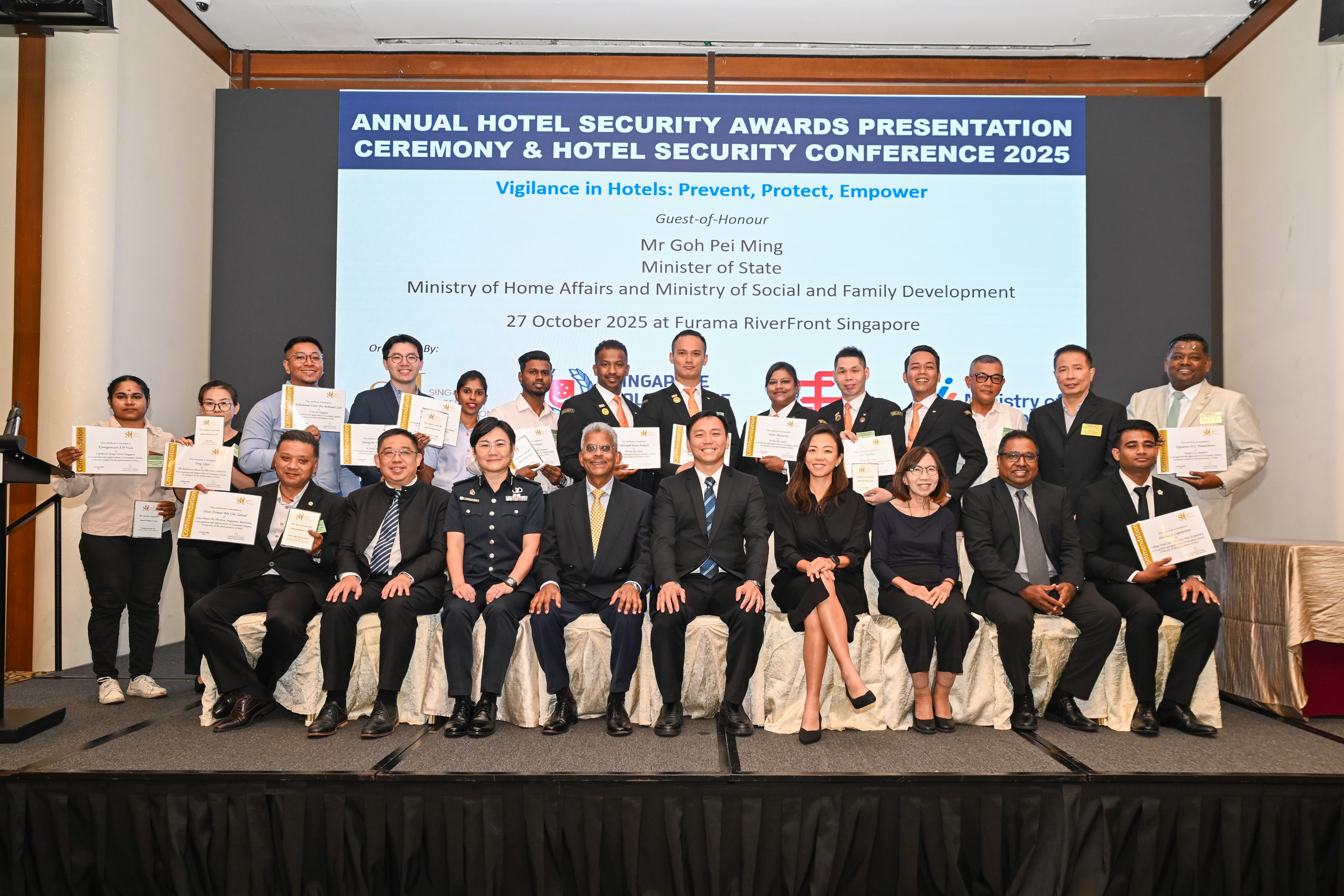 Group of people posing with certificates at the Annual Hotel Security Awards Presentation Ceremony and Conference 2025.