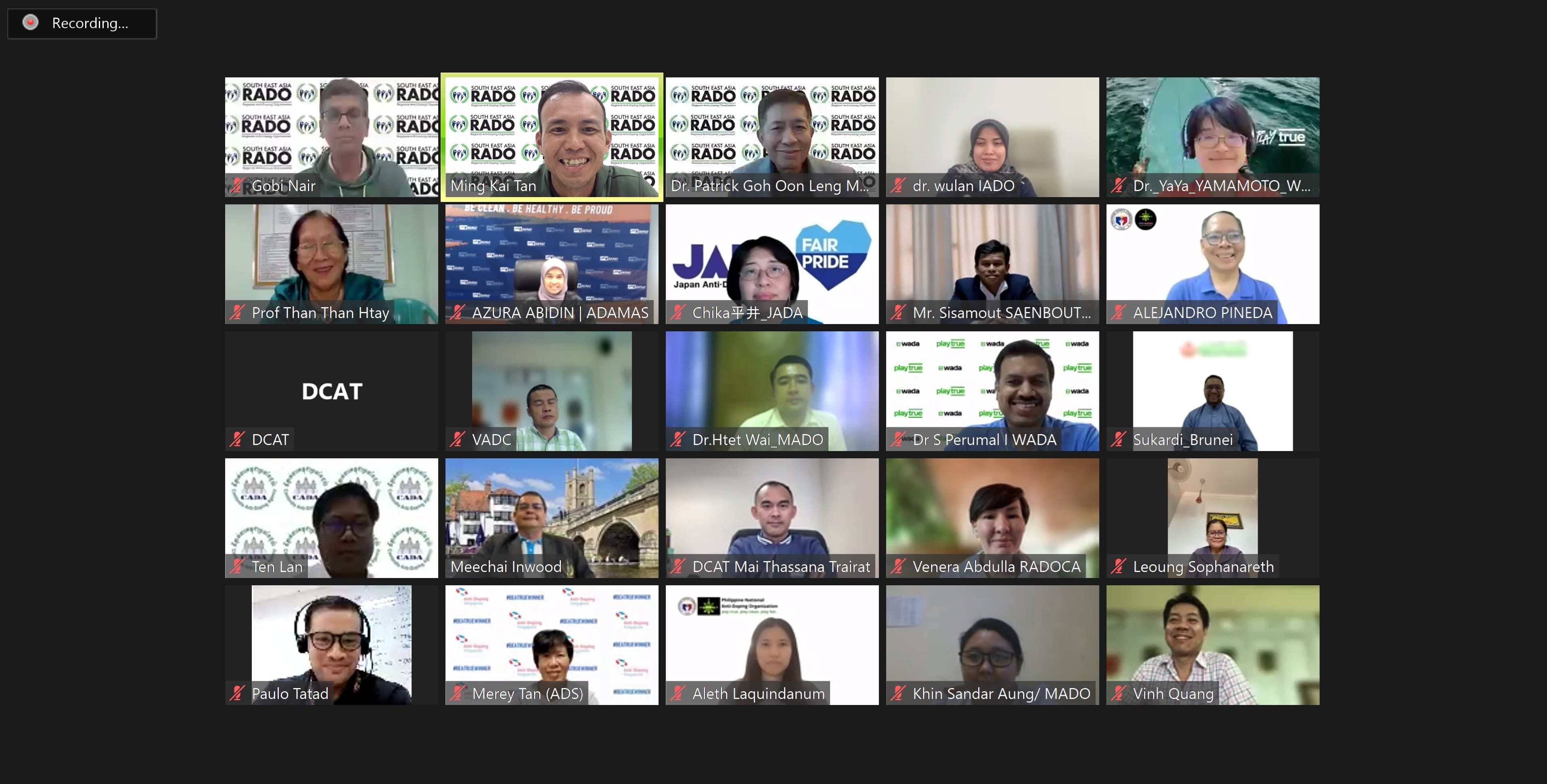 Video call grid showing 24 participants, some muted, with names and various virtual backgrounds.
