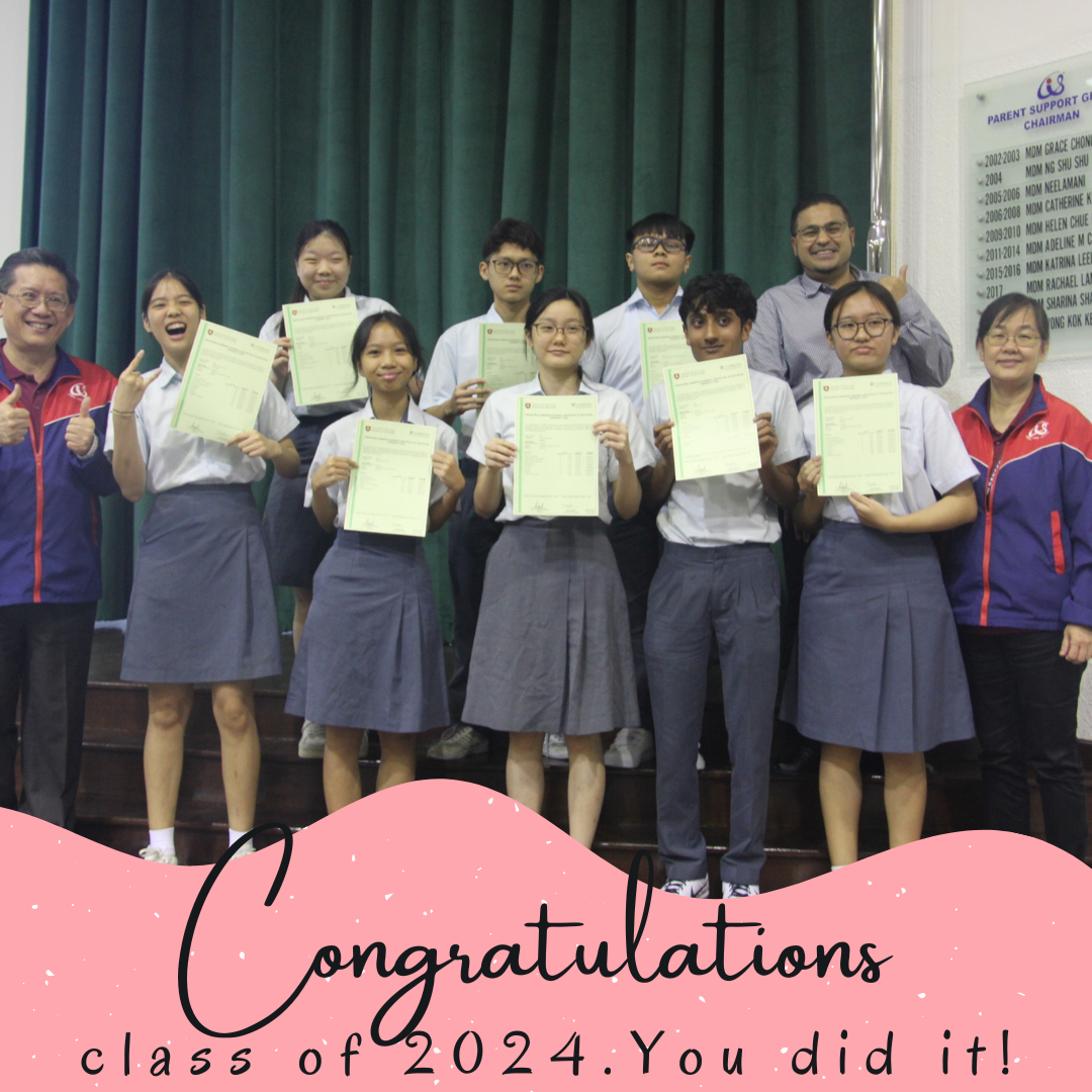 Students pose for a photo with school principals