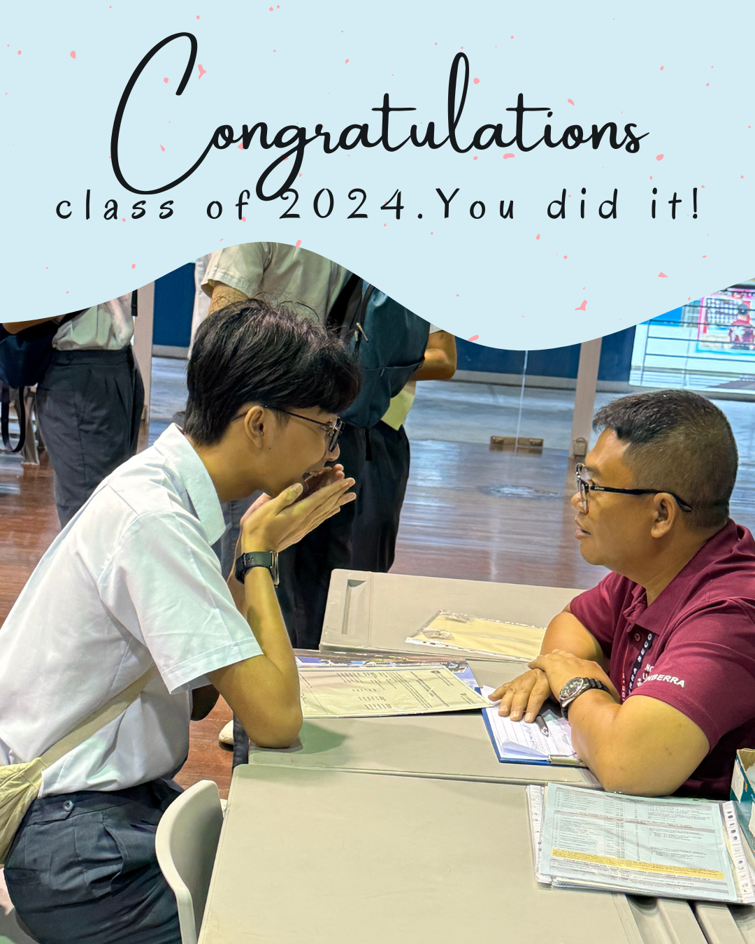Student surprised as he speaks with teacher