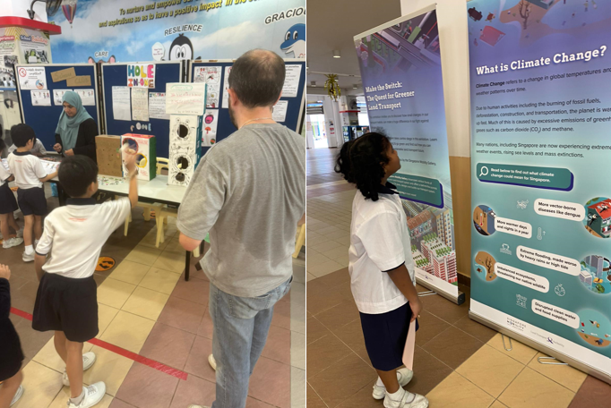 Students view school science fair displays, including a climate change banner explaining its effects.