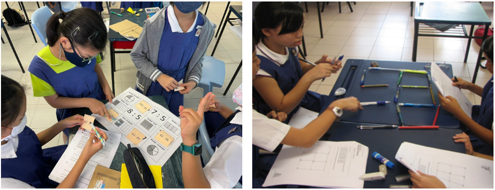 Students in blue uniforms doing math activities at desks, one group with a worksheet, another arranging pens on a board.