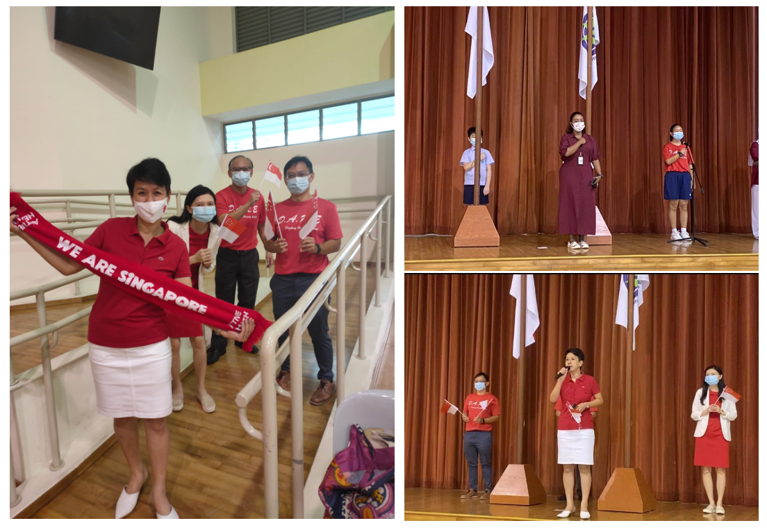 People in red tops wearing masks at a Singapore National Day event, holding flags and a "We Are Singapore" scarf.