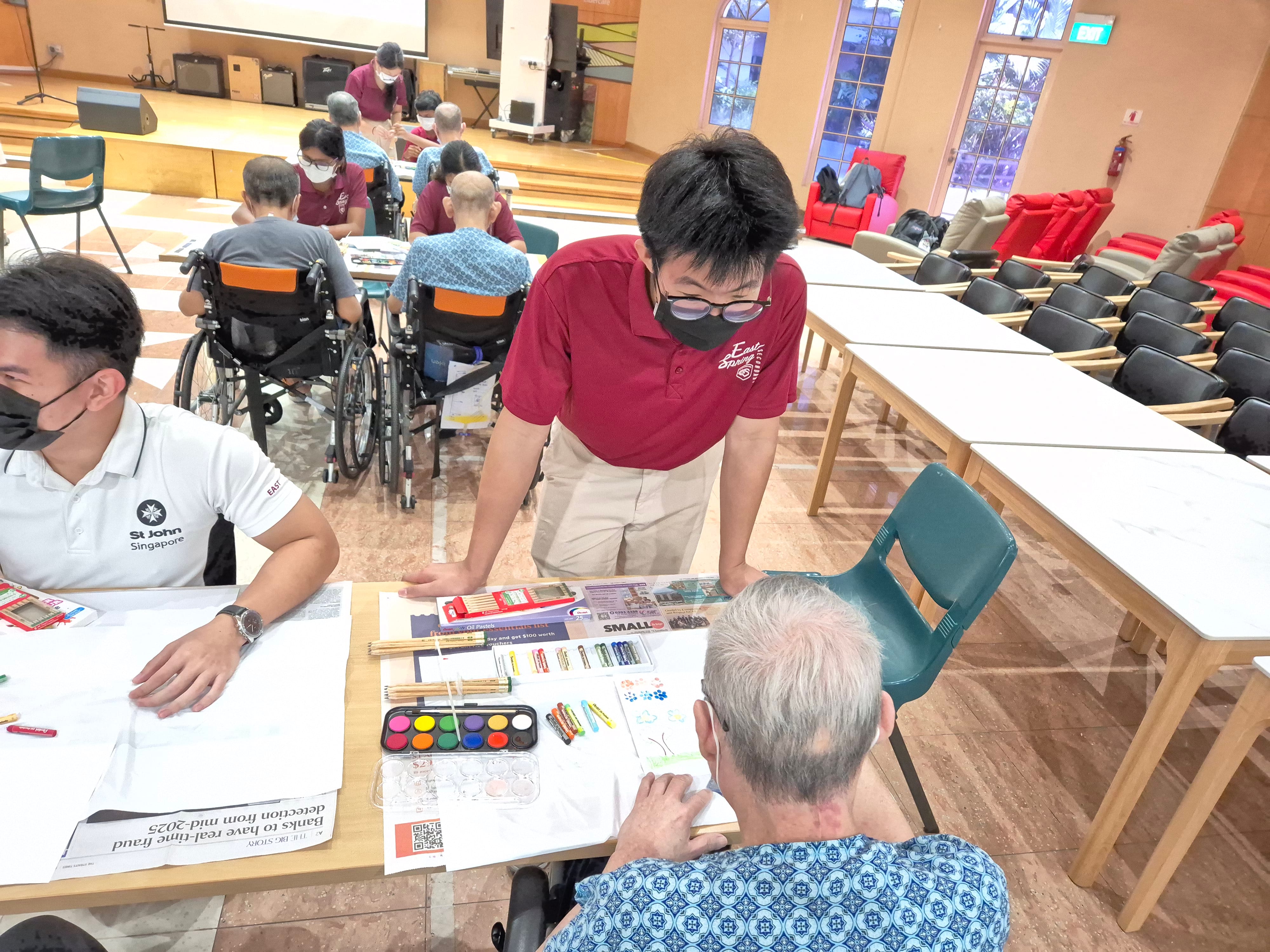 Sjab students engaging elderly in art