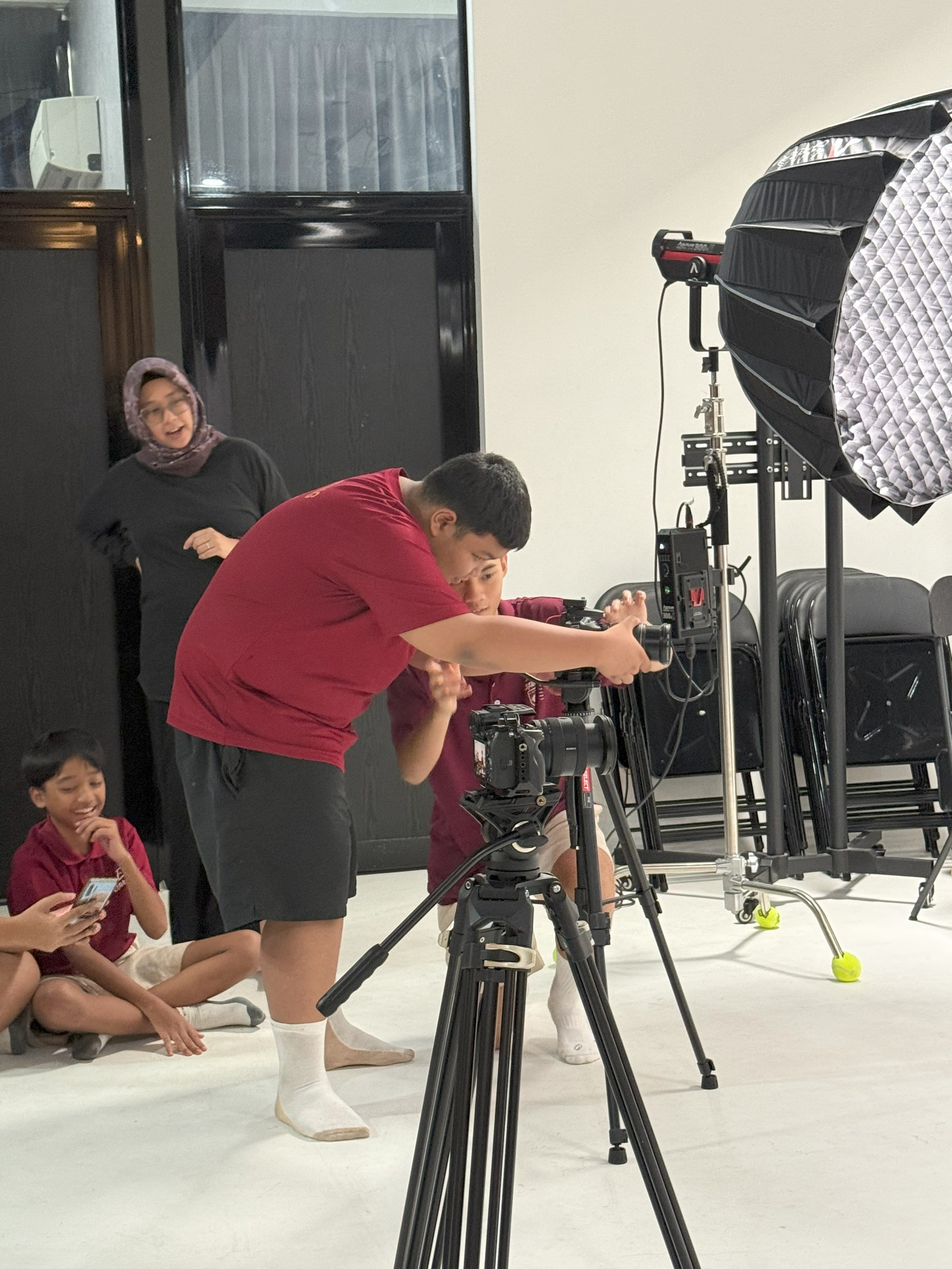 Boy prepare to take a photo