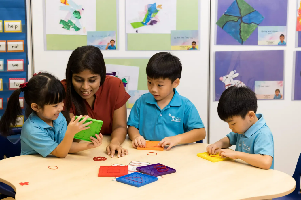 Children playing with pattern blocks