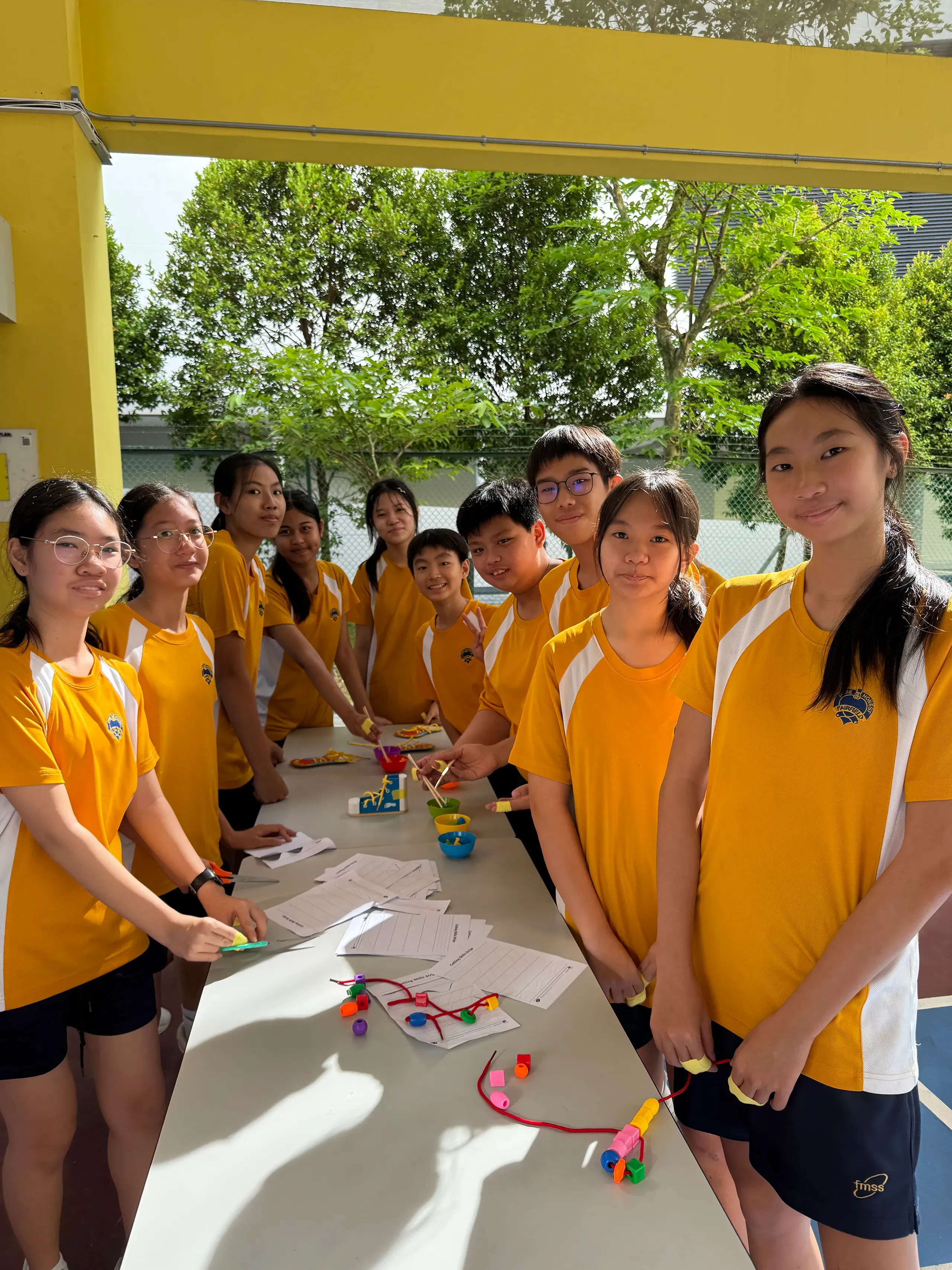 Secondary 2 Fairsians participating in an experiential simulation activity during Diff-Ability Day.