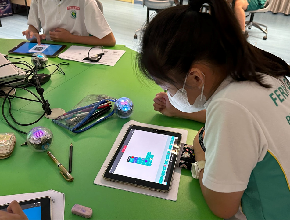 Building logic, creativity, and problem-solving—students learning to code during Code for Fun!