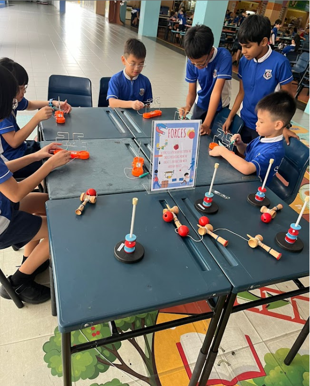 Students experiment on forces