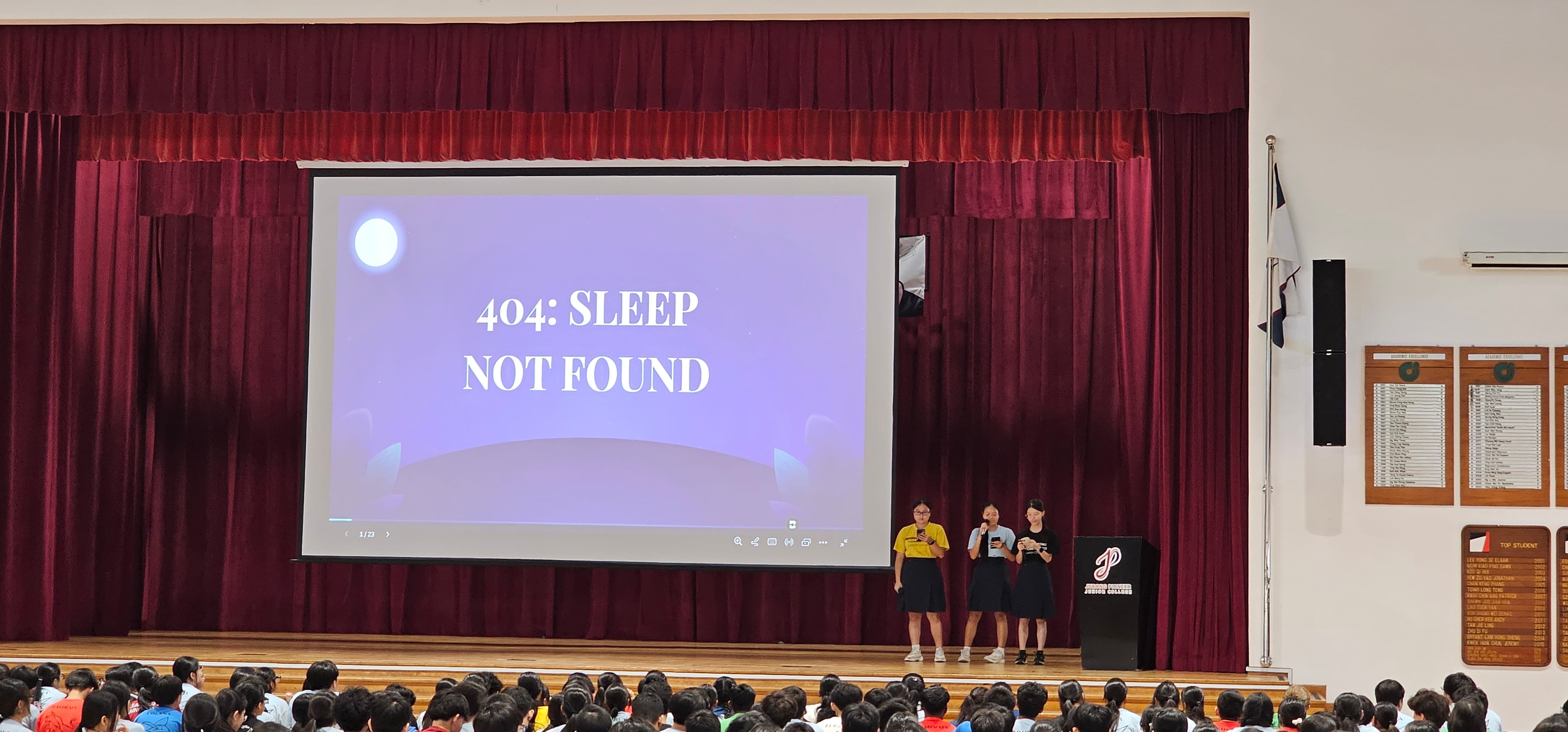 3 female students sharing on stage