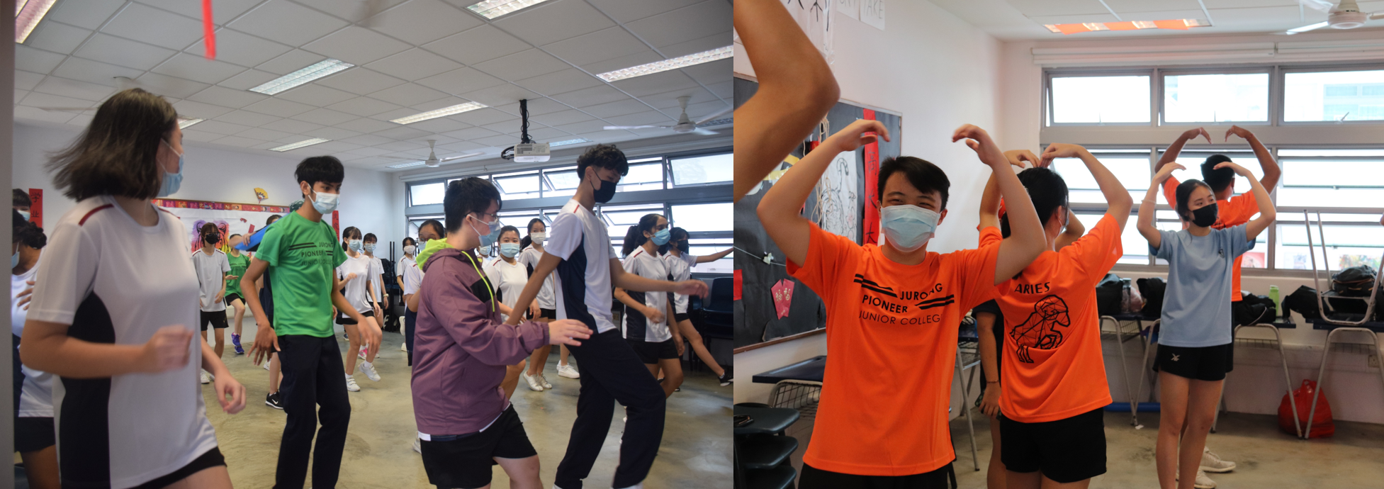 Students wearing masks dance and pose with raised arms in a classroom, some in orange Jurong Pioneer Junior College shirts.