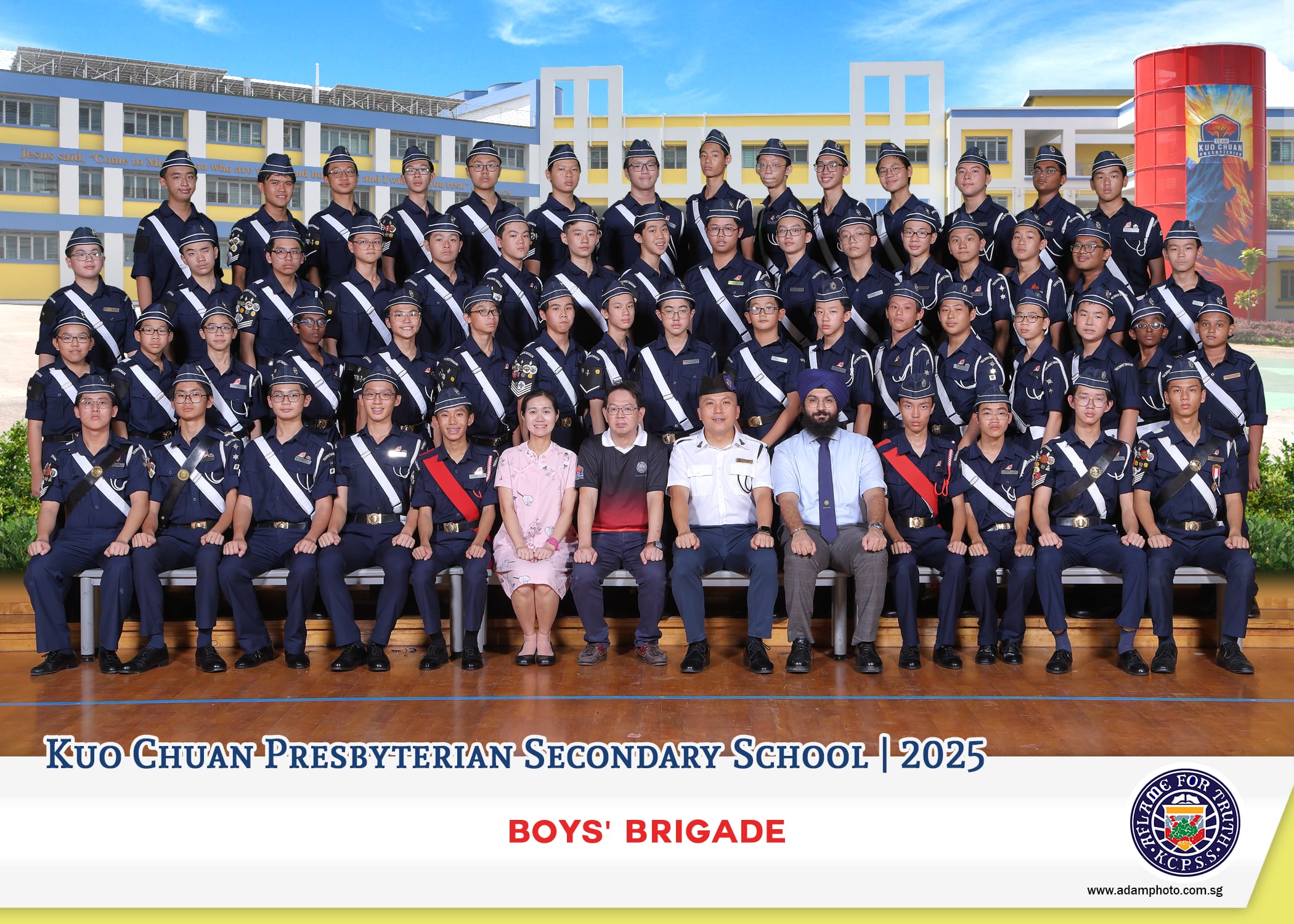 Group photo of Kuo Chuan Presbyterian Secondary School Boys' Brigade members in navy uniforms with teachers, 2025.