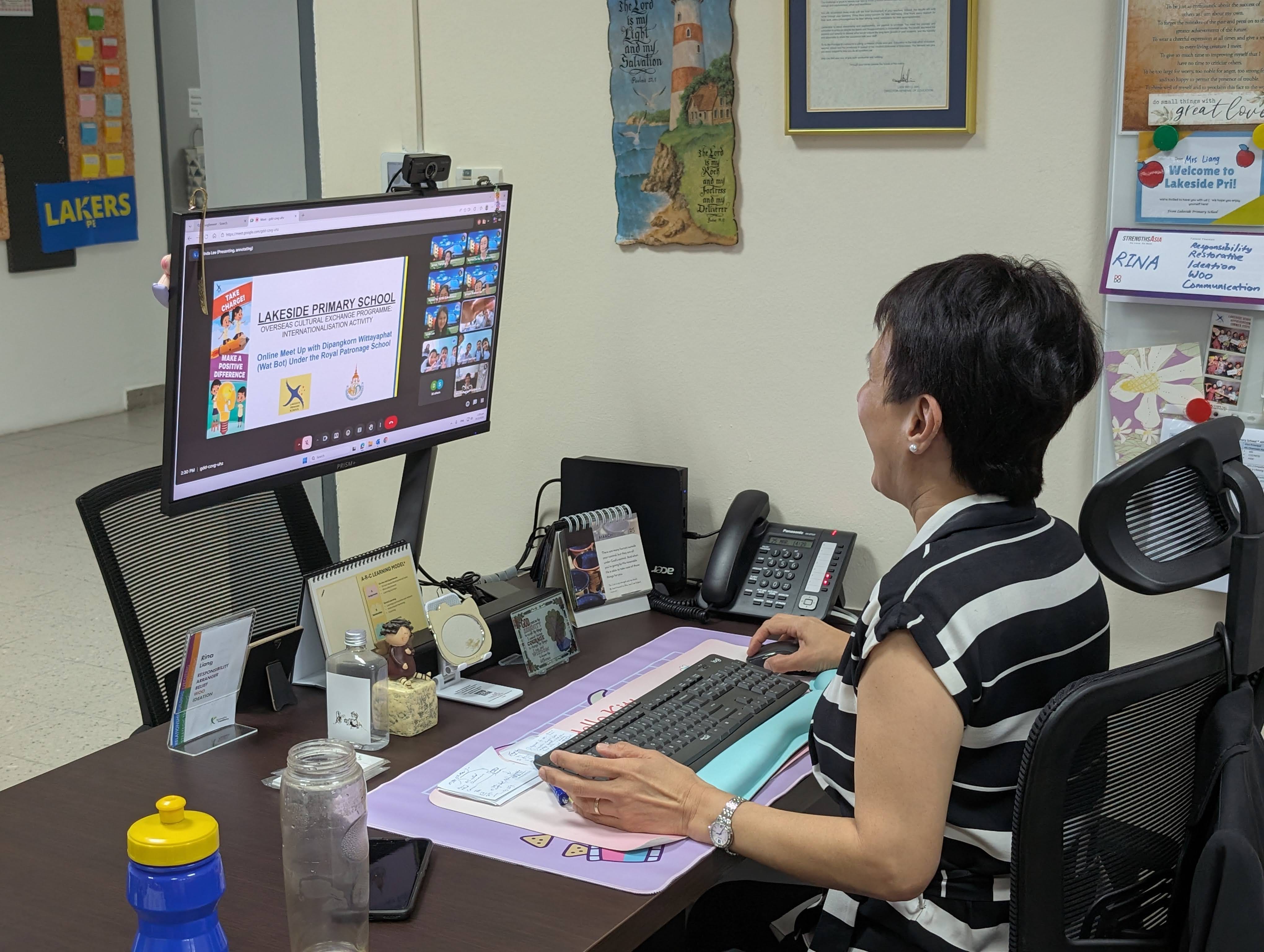 Our principal, Mrs Liang, warmly welcoming the students from Thailand via google meet